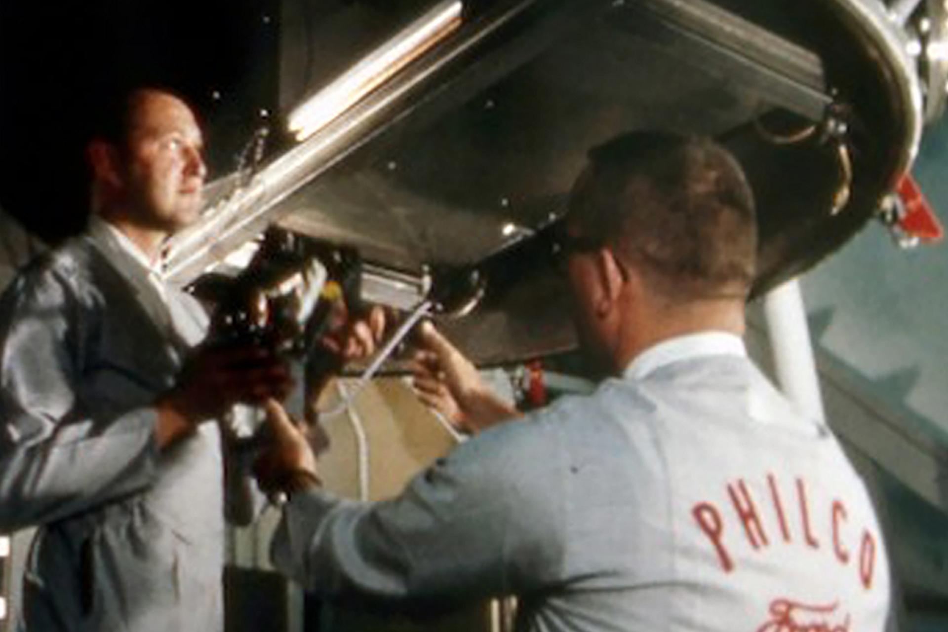 Philco-Ford employees install equipment