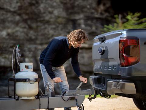 A trailer being hooked up to a 2024 Ford Ranger® pickup