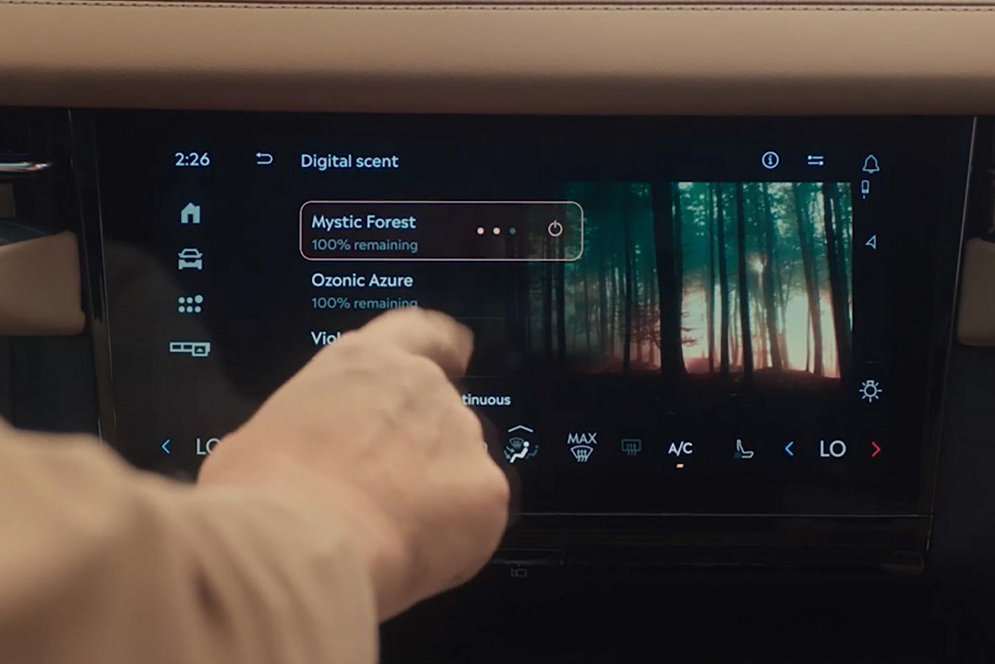A person uses the Center touchscreen to select a Digital Scent