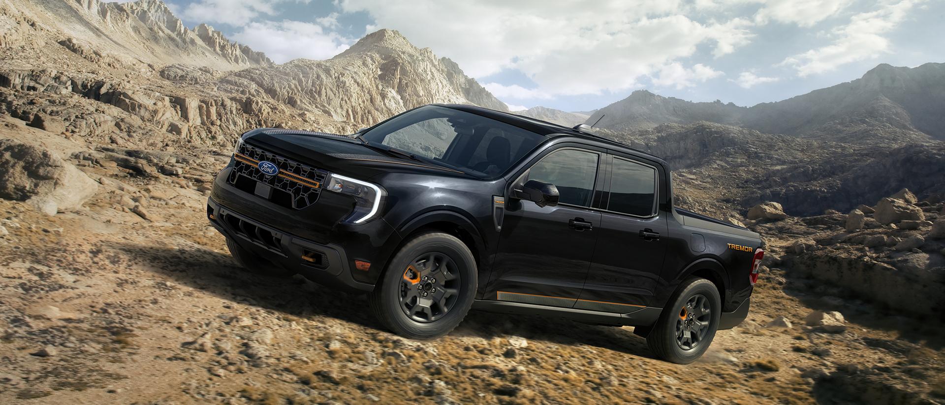 2026 Ford Maverick® Tremor® model being driven up a rocky mountain side