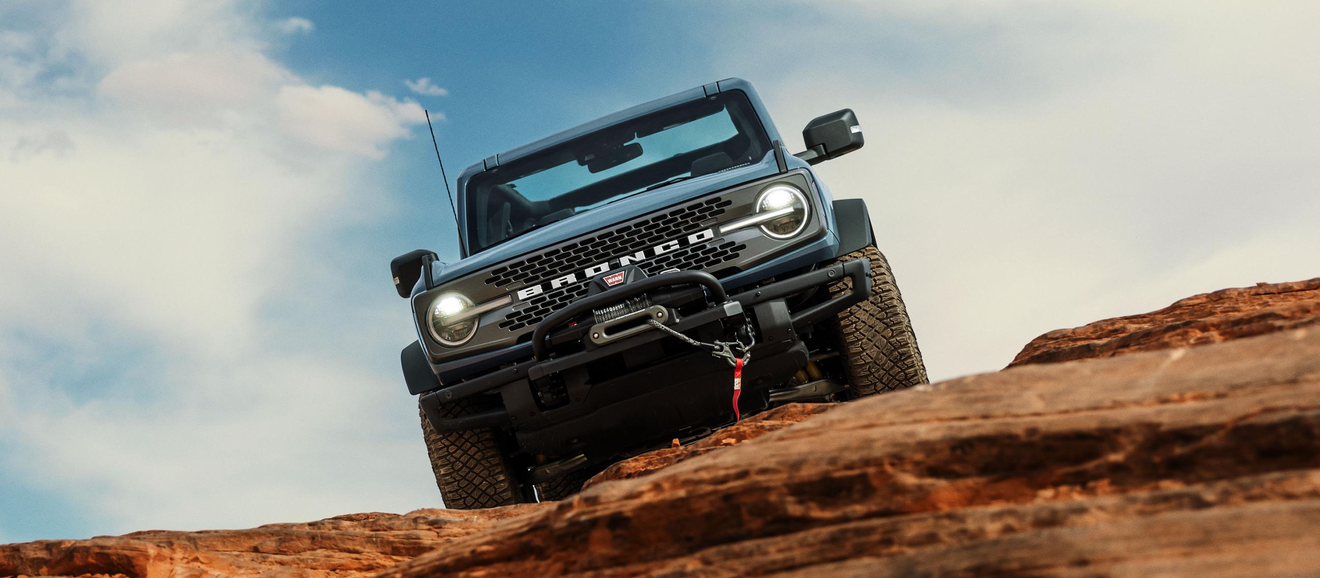The Ford Bronco® SUV parked on top of a rock formation