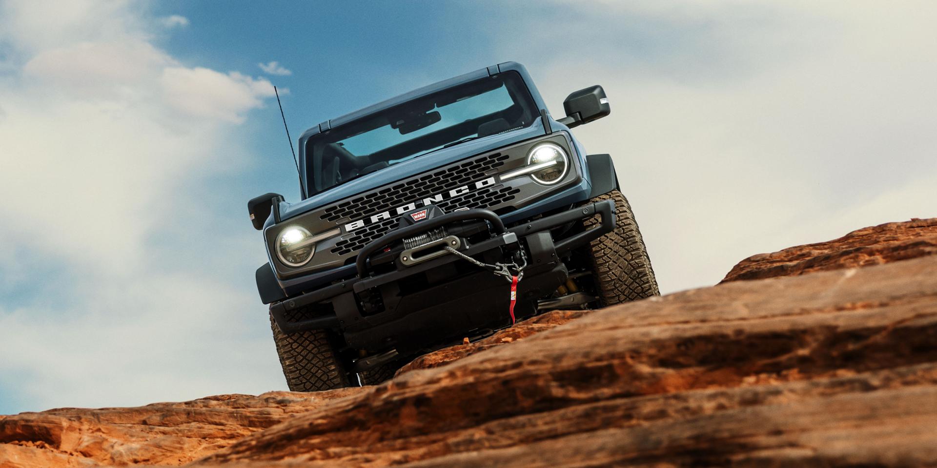 The Ford Bronco® SUV parked on top of a rock formation