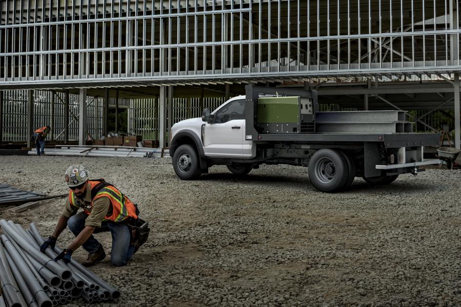 2025 Ford Super Duty® F-550® XL flatbed parked at a jobsite