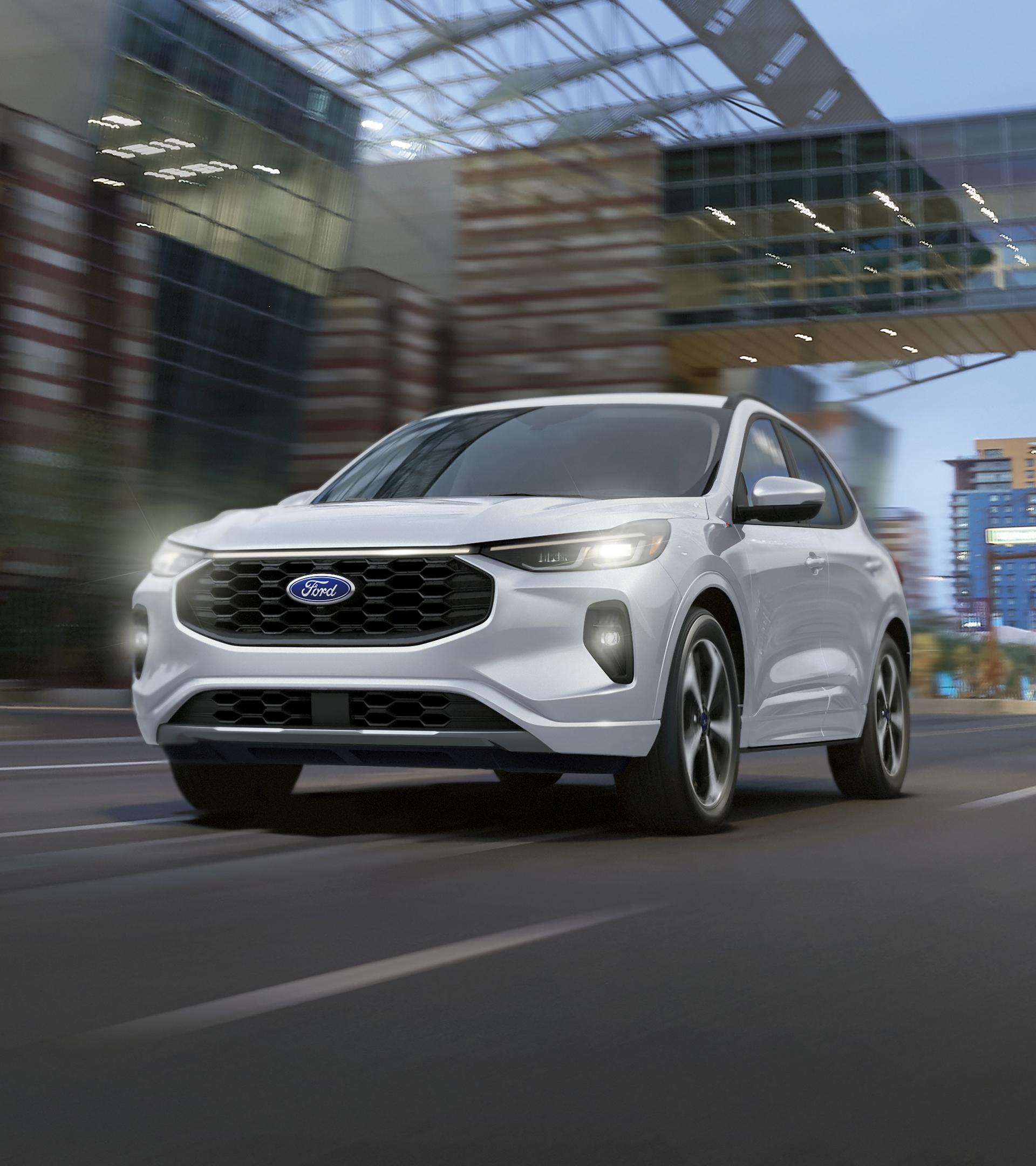 2026 Ford Escape® SUV being driven on a city street