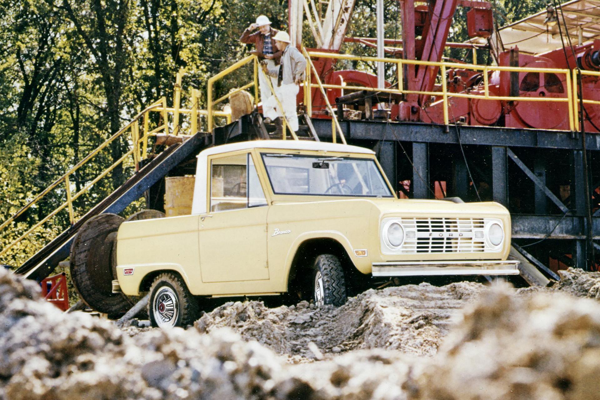 A 1969 Ford Bronco® parked near a pedestrian overlook