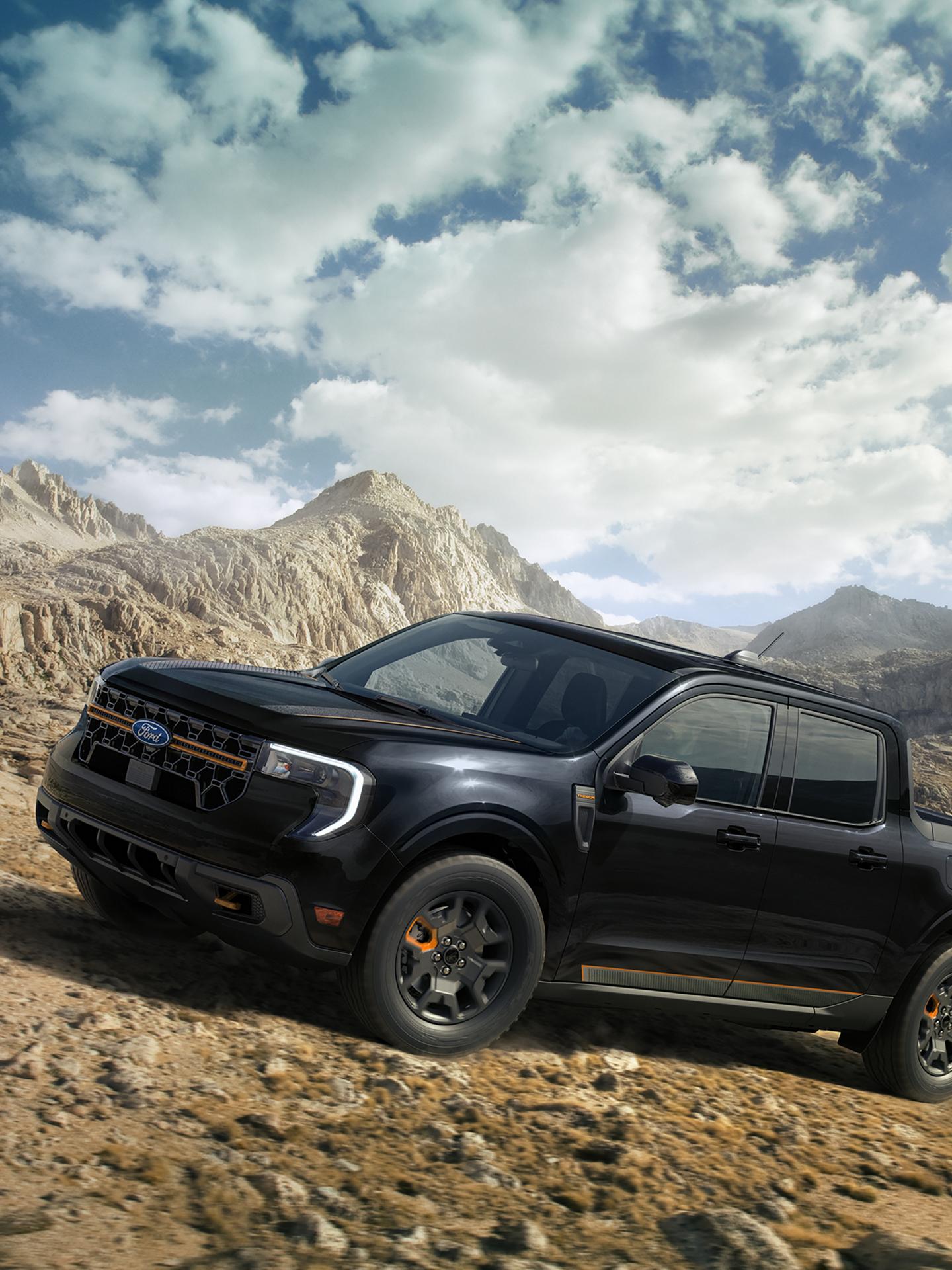 2026 Ford Maverick® Tremor® model in Shadow Black being driven on a rocky mountainside