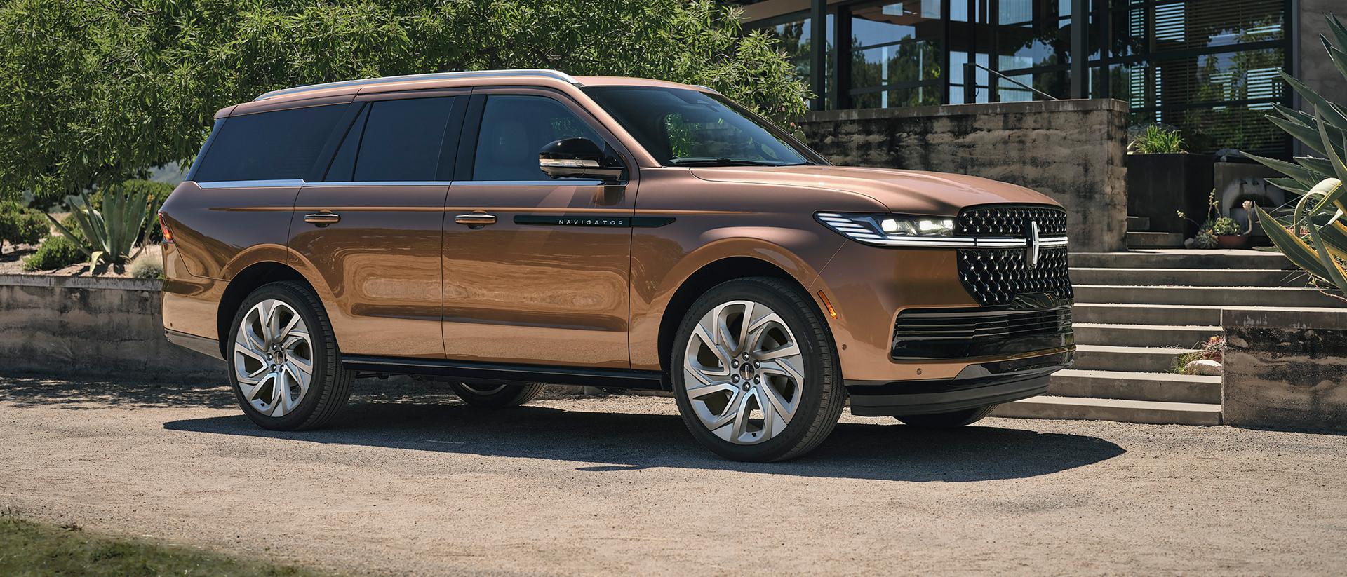 The 2025 Lincoln Navigator parked outside a building.