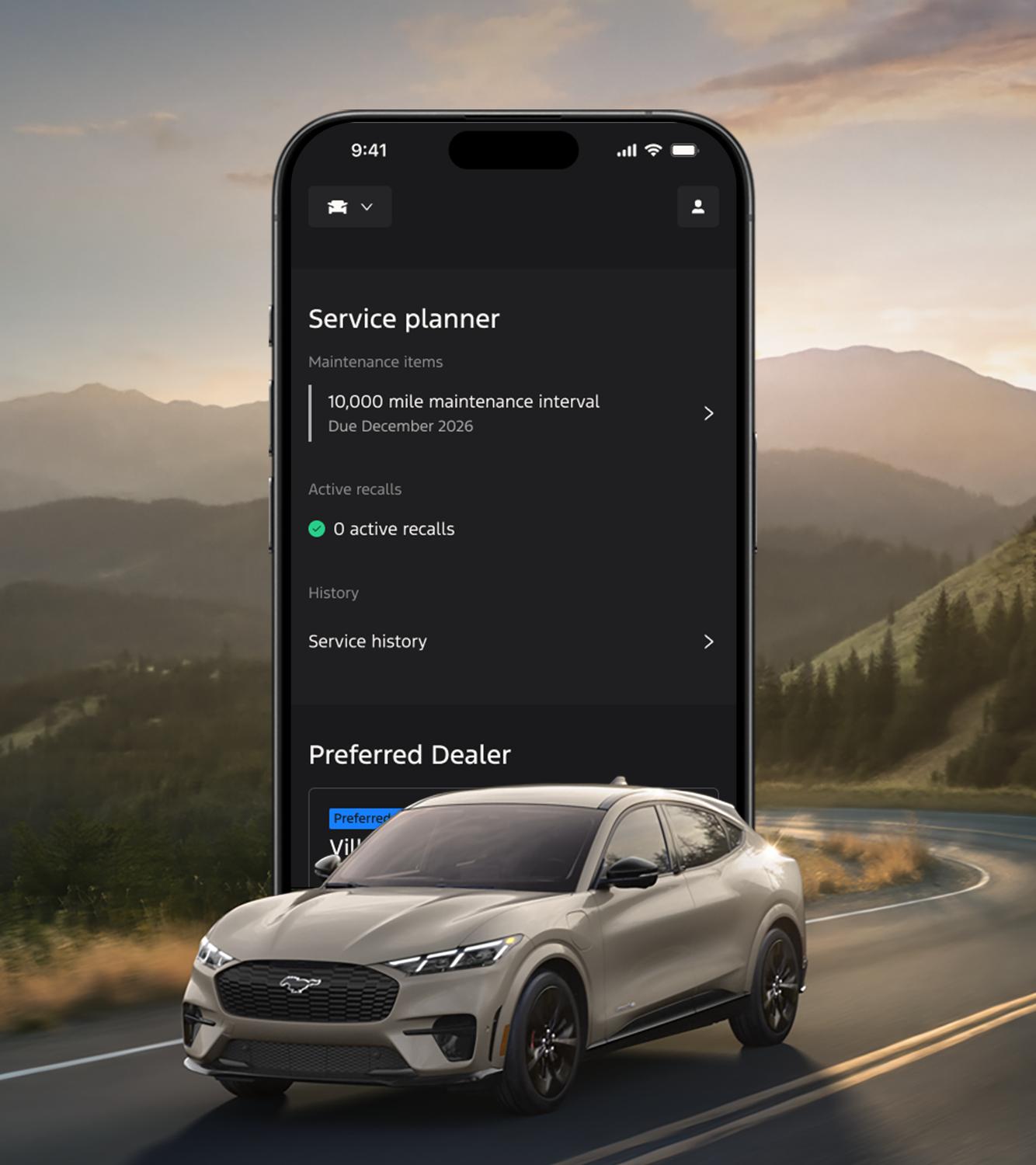 The Ford app screen displays on the horizon behind a 2026 Ford Mustang Mach-E® SUV