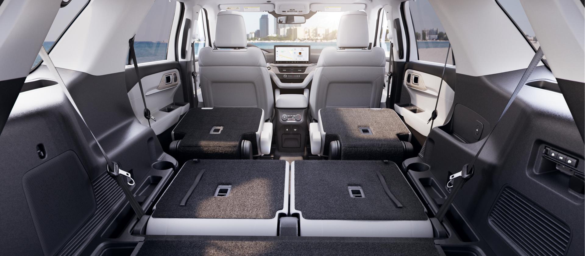 The cargo area of a 2026 Ford Explorer® SUV with the rear seats folded down