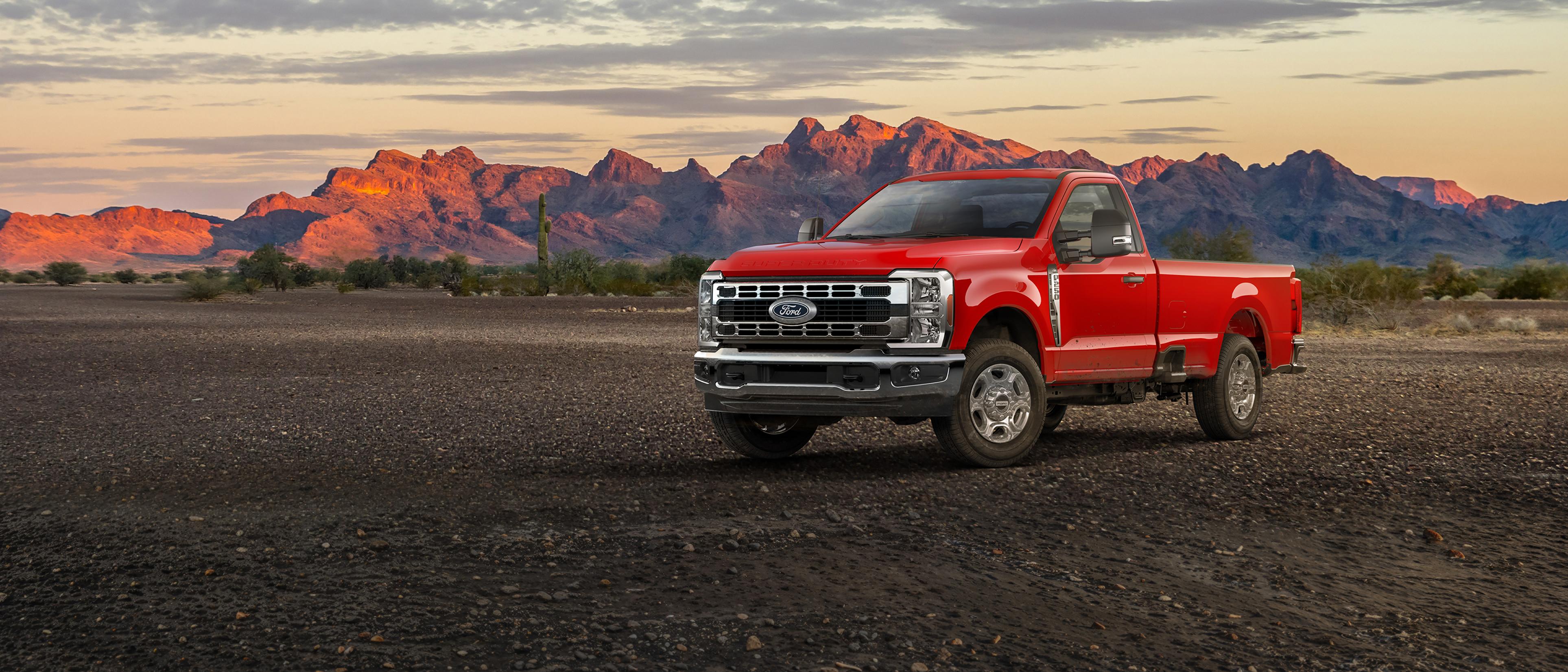 2027 Ford Super Duty® F-250® XLT truck parked on a dirt road in the mountains