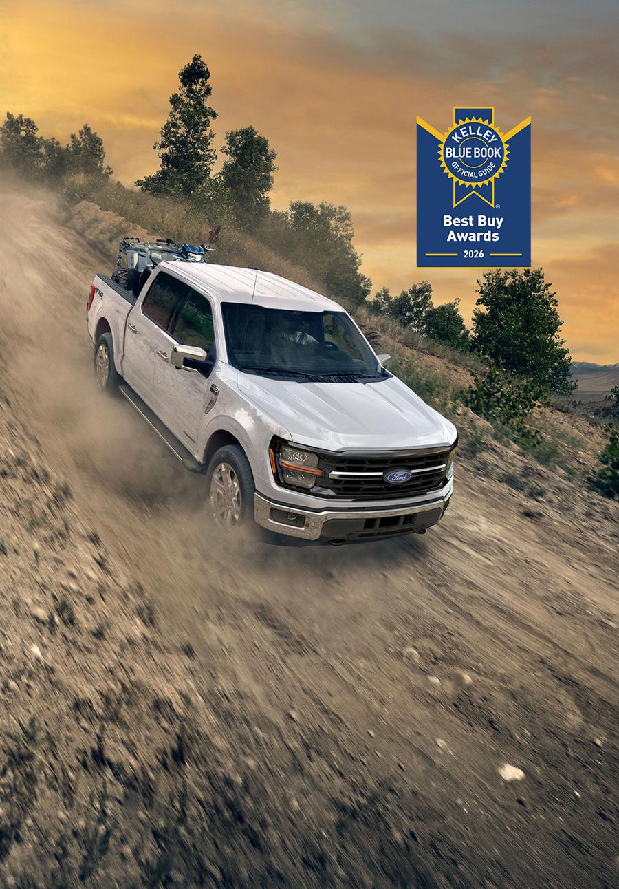A white 2026 Ford F-150® being driven down a rocky hill