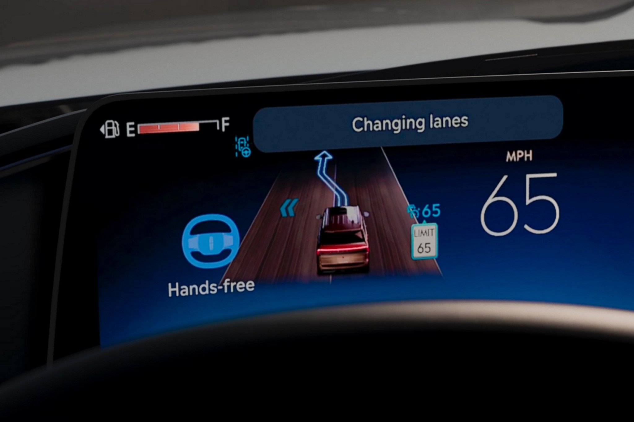 The driver information cluster of a 2025 Lincoln Navigator® SUV indicates an upcoming lane change via Lane Change Assist