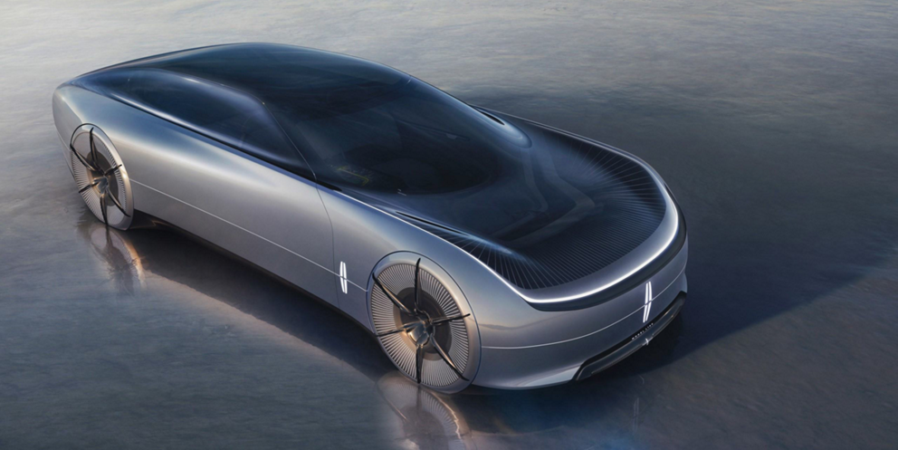 The Lincoln Model L100 concept vehicle is shown here parked on a reflective surface.