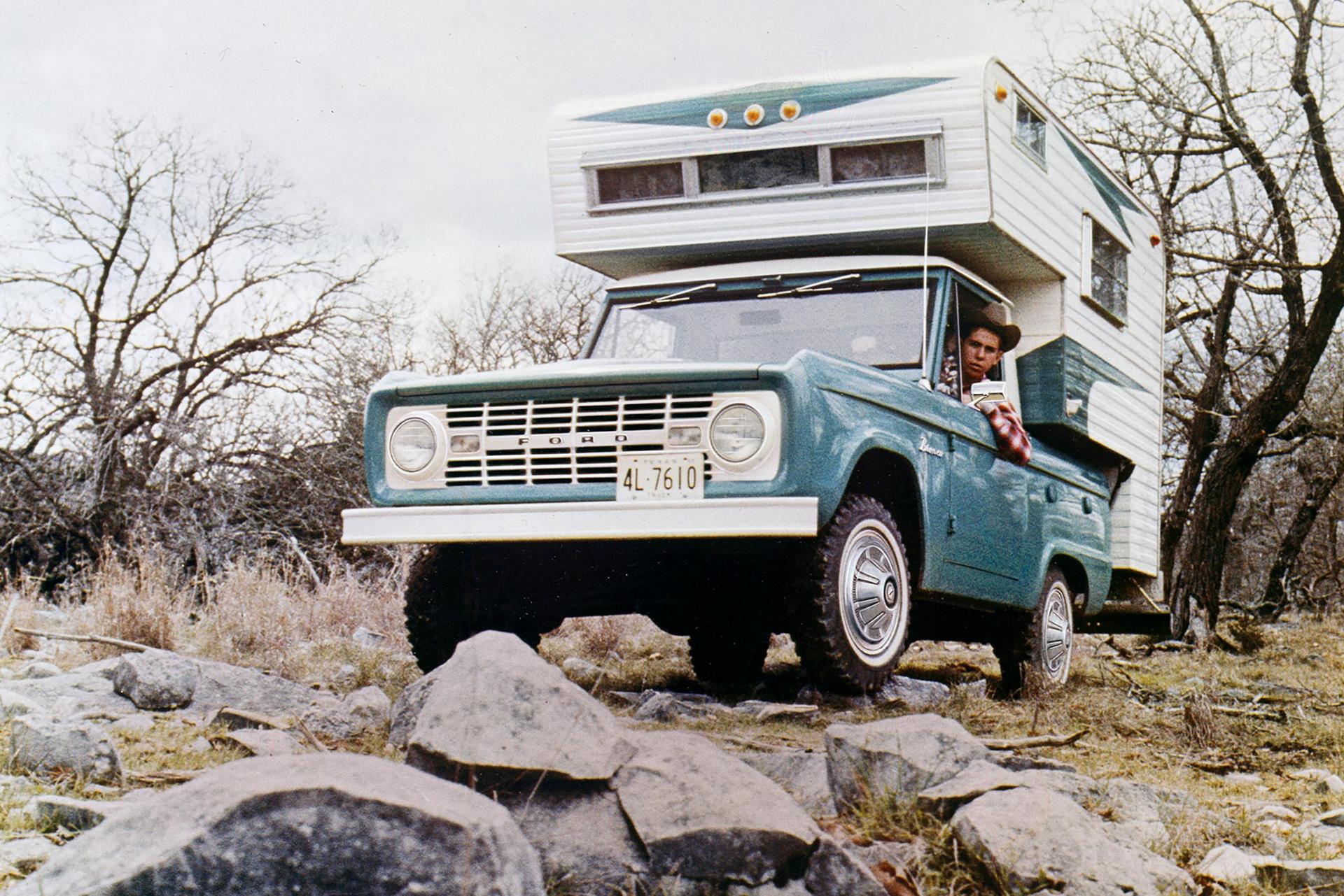 A 1967 Ford Bronco® model outfitted with a camper