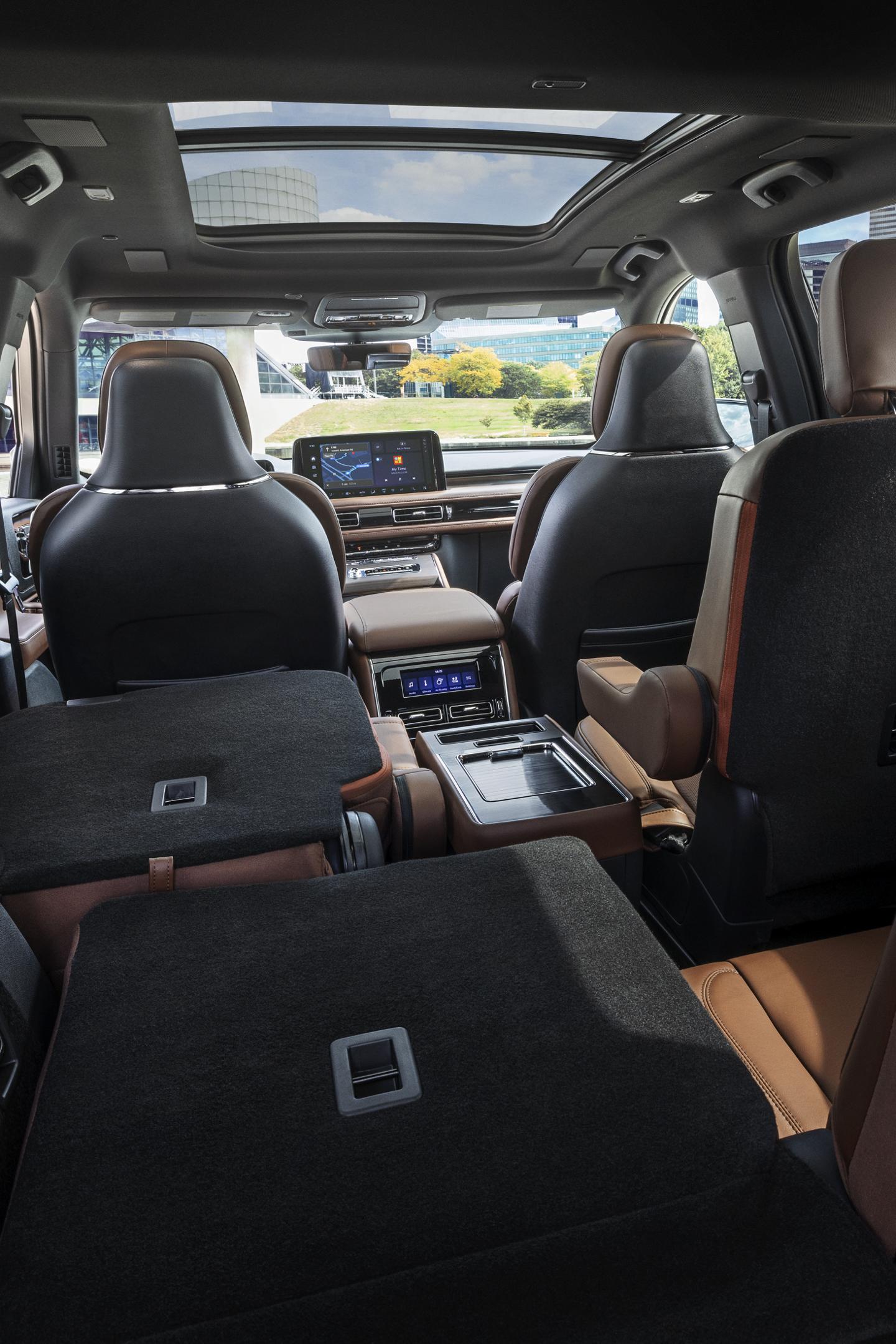 One side of the PowerFold® third-row seat and a second-row seat are folded forward in the 2025 Lincoln Aviator® SUV