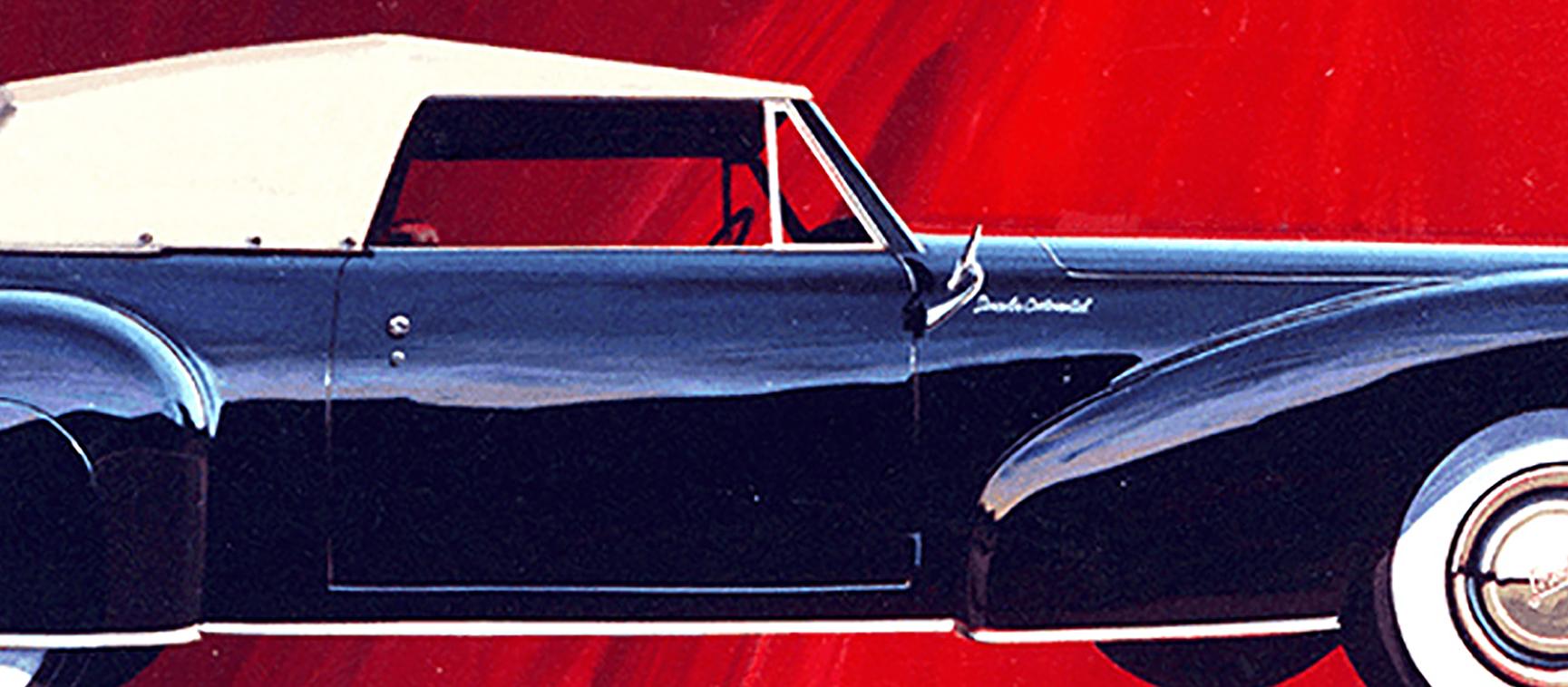 Historic original blue Lincoln continental on red background