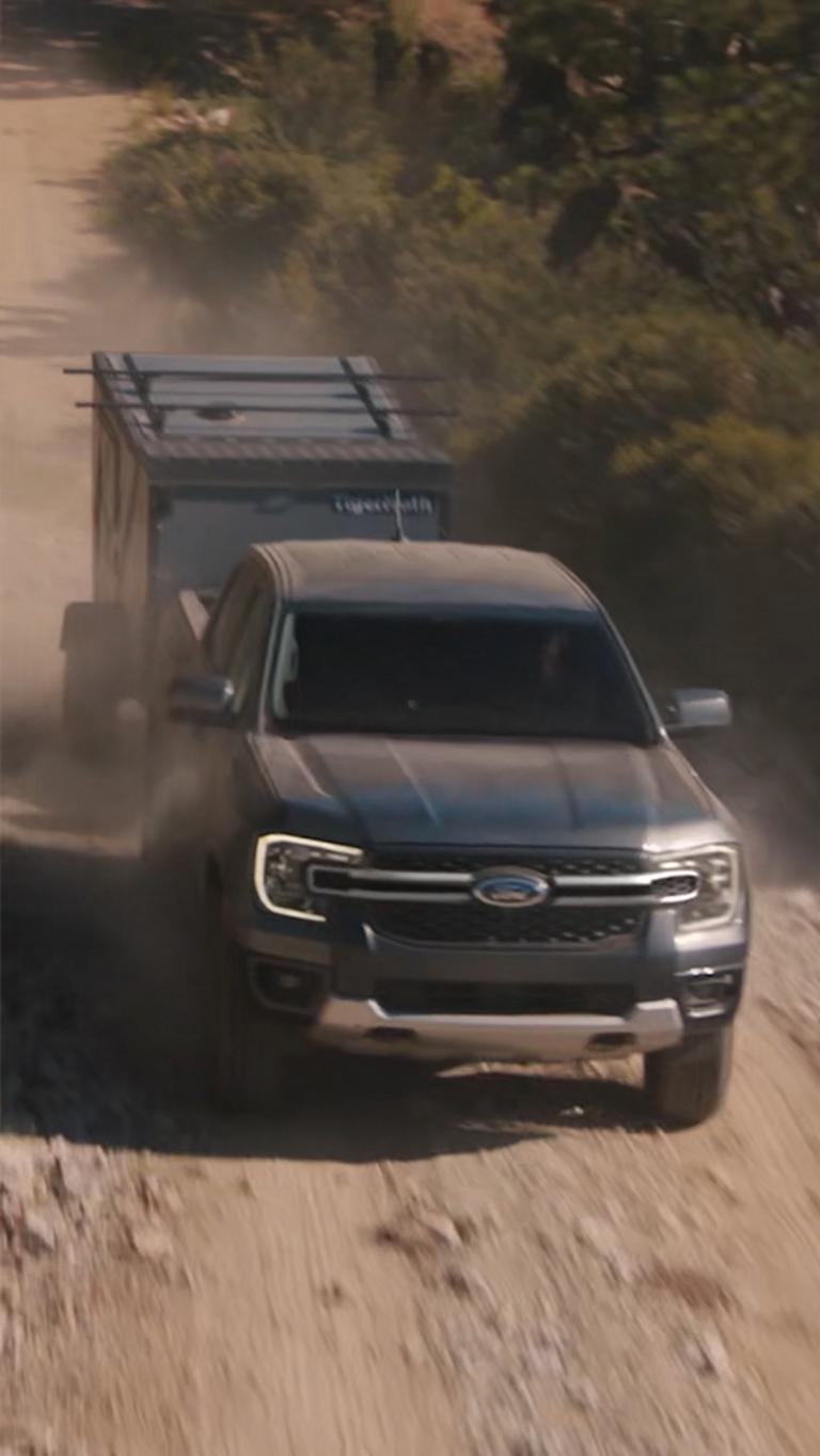 2026 Ford Ranger® towing a trailer up a mountain