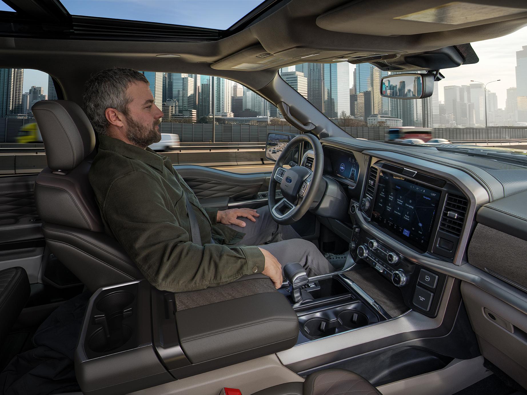 A man drives hands-free with Ford BlueCruise in a Ford F-150® truck