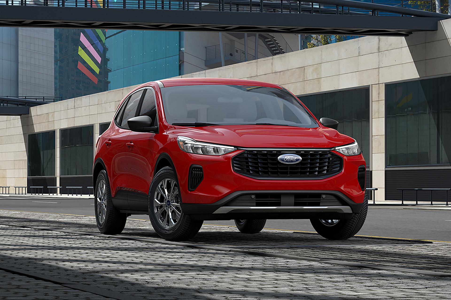 A 2024 Ford Escape Active® model parked in front of a concrete building