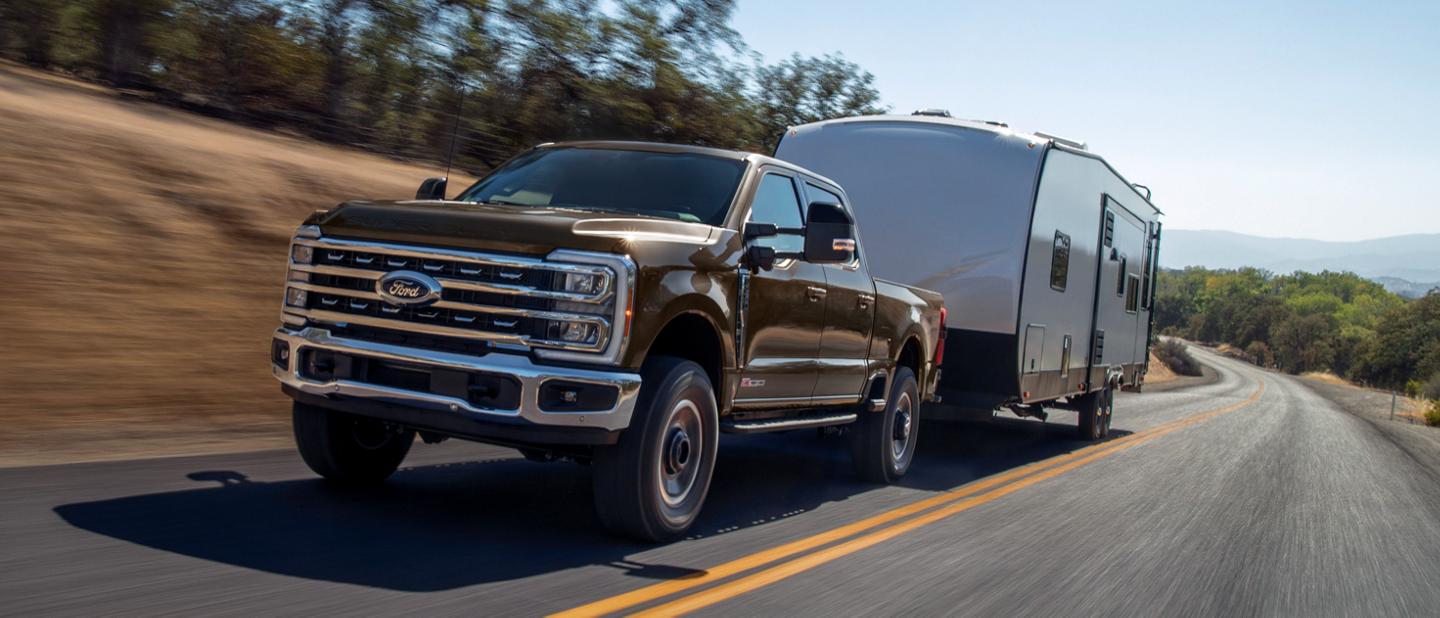 2025 Ford Super Duty® F-250® LARIAT® model pulling a camper