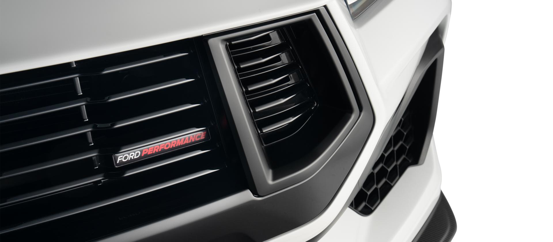 Detail of the unique modular front grille with black inserts