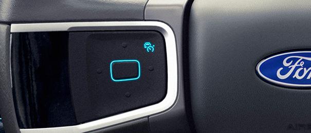 Adaptive Cruise Control button on the steering wheel of a Ford Expedition® SUV
