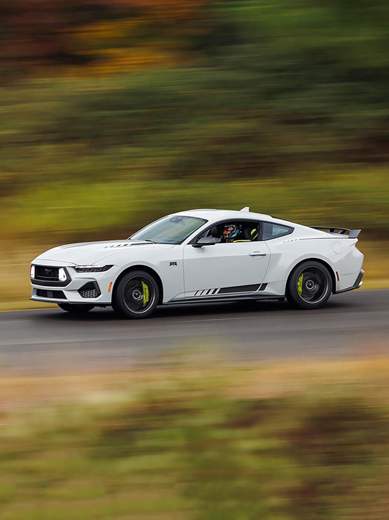 2026 Ford Mustang® RTR® fastback being driven on a road