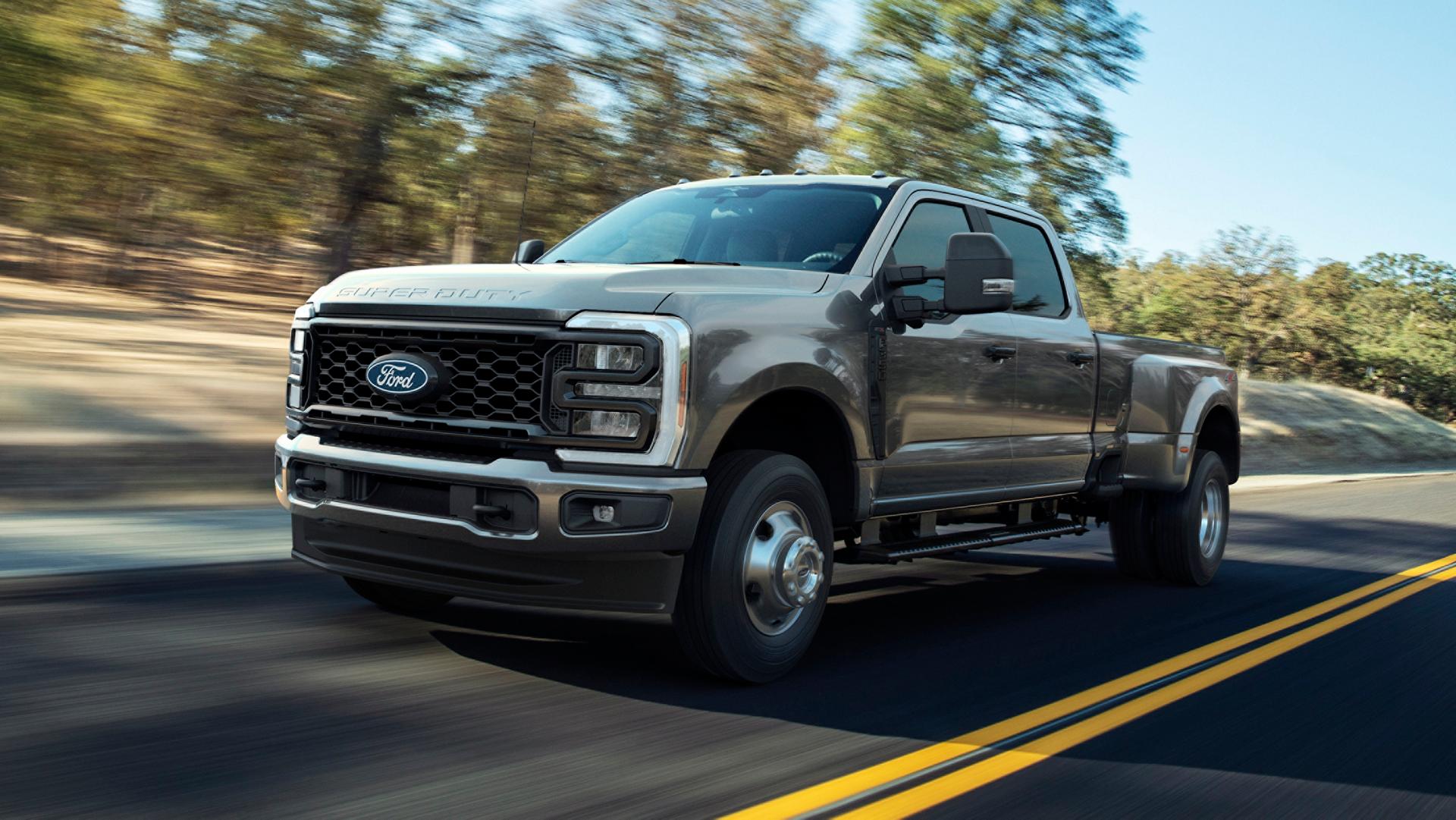 2027 Super Duty® F-250® with the STX® Appearance Package driving on a paved road.