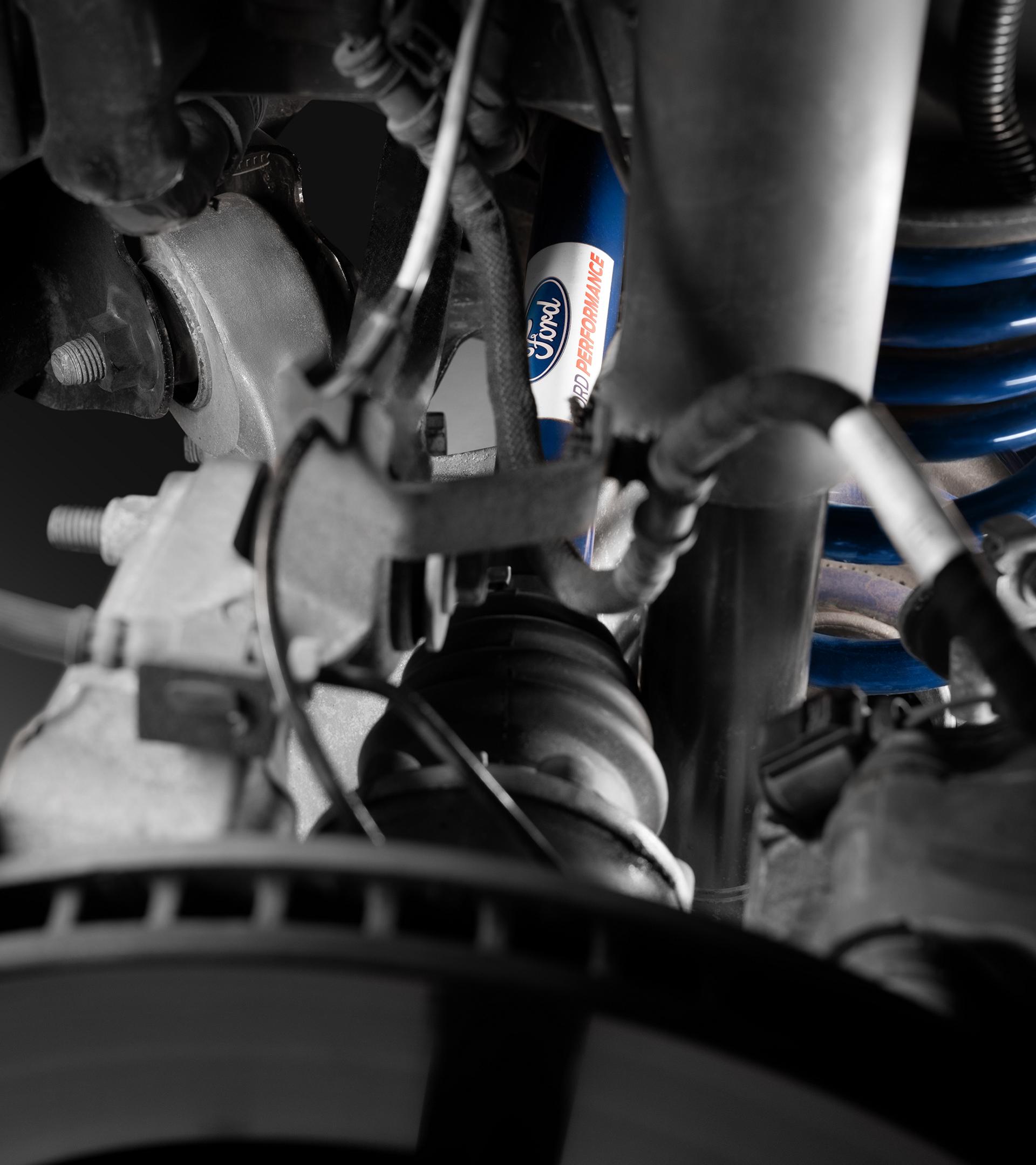 Underbody detail of the upgraded half-shaft behind the wheel