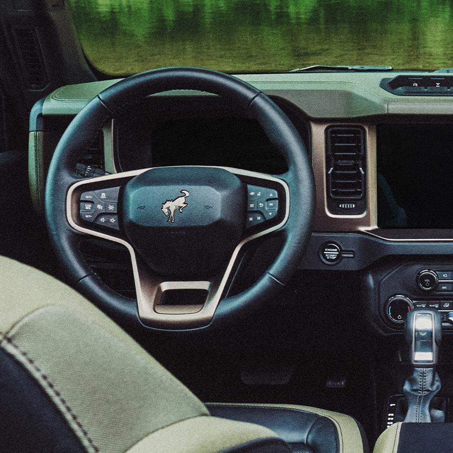 The dashboard and center console inside a 2027 Ford Bronco® Filson™ SUV