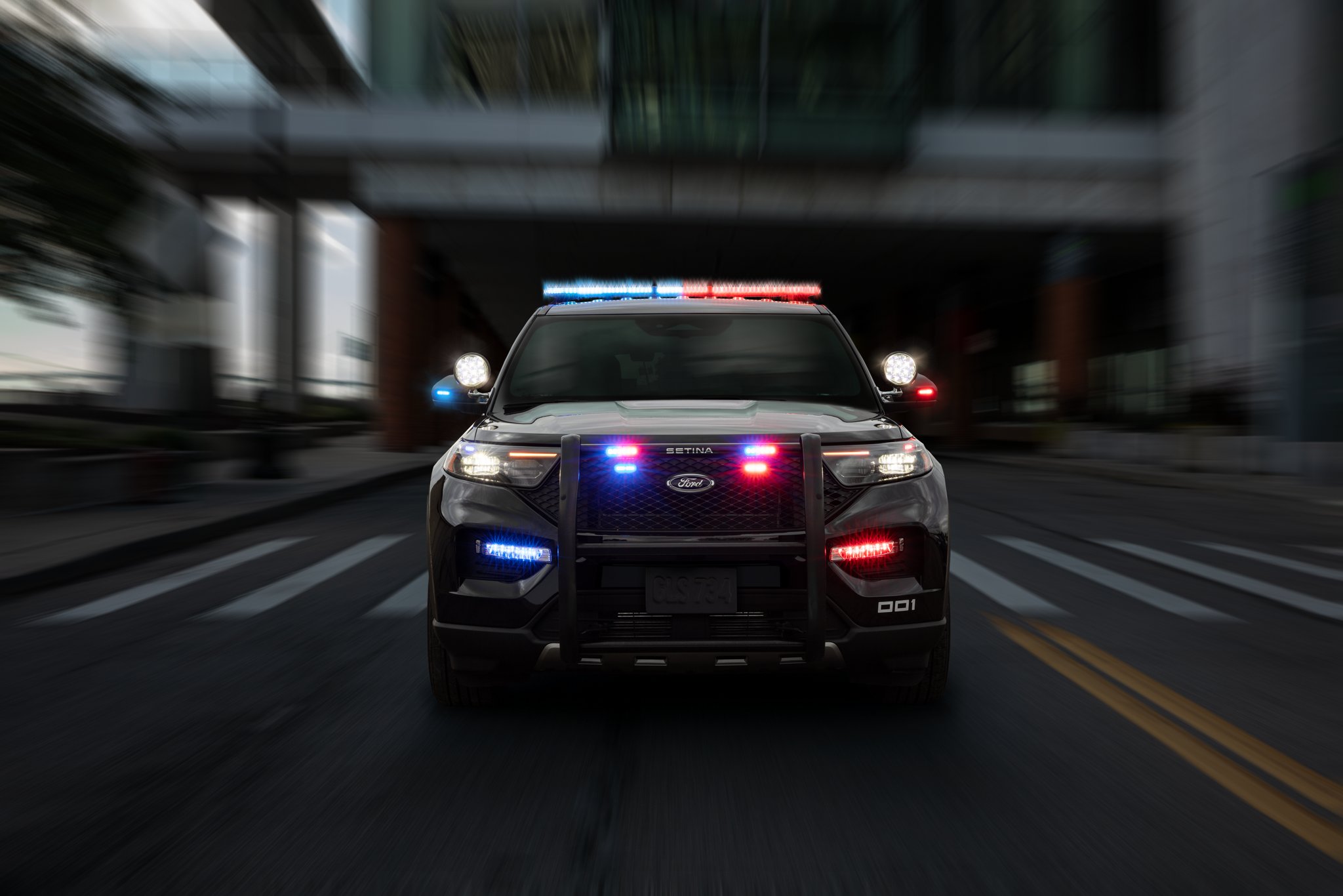 The 2025 Ford Police Interceptor® Utility being driven in an urban environment
