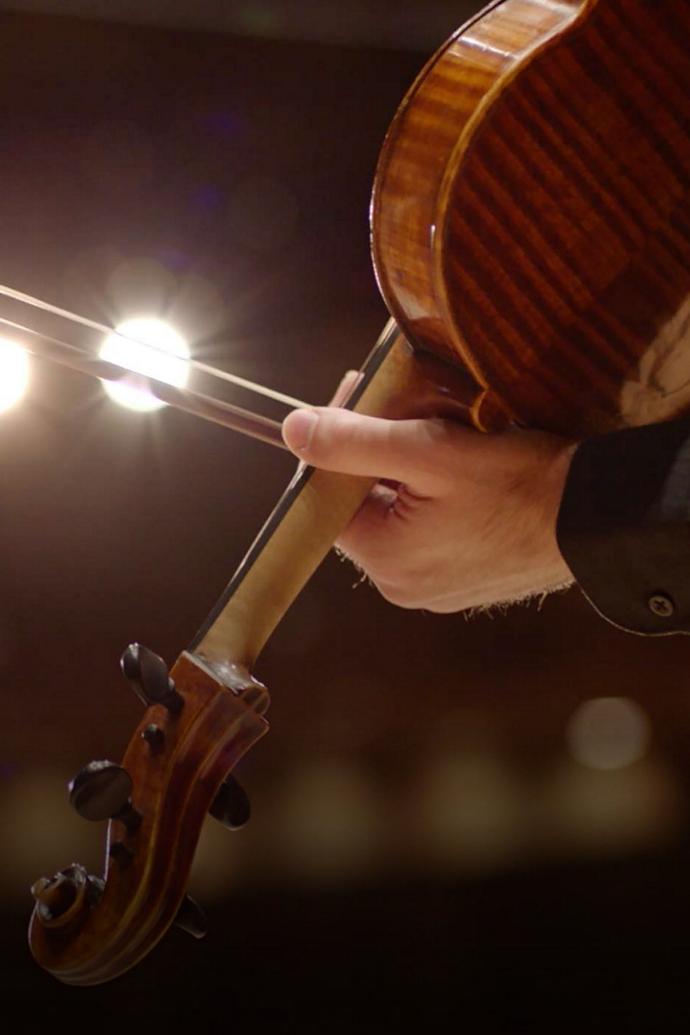 A man playing the violin.