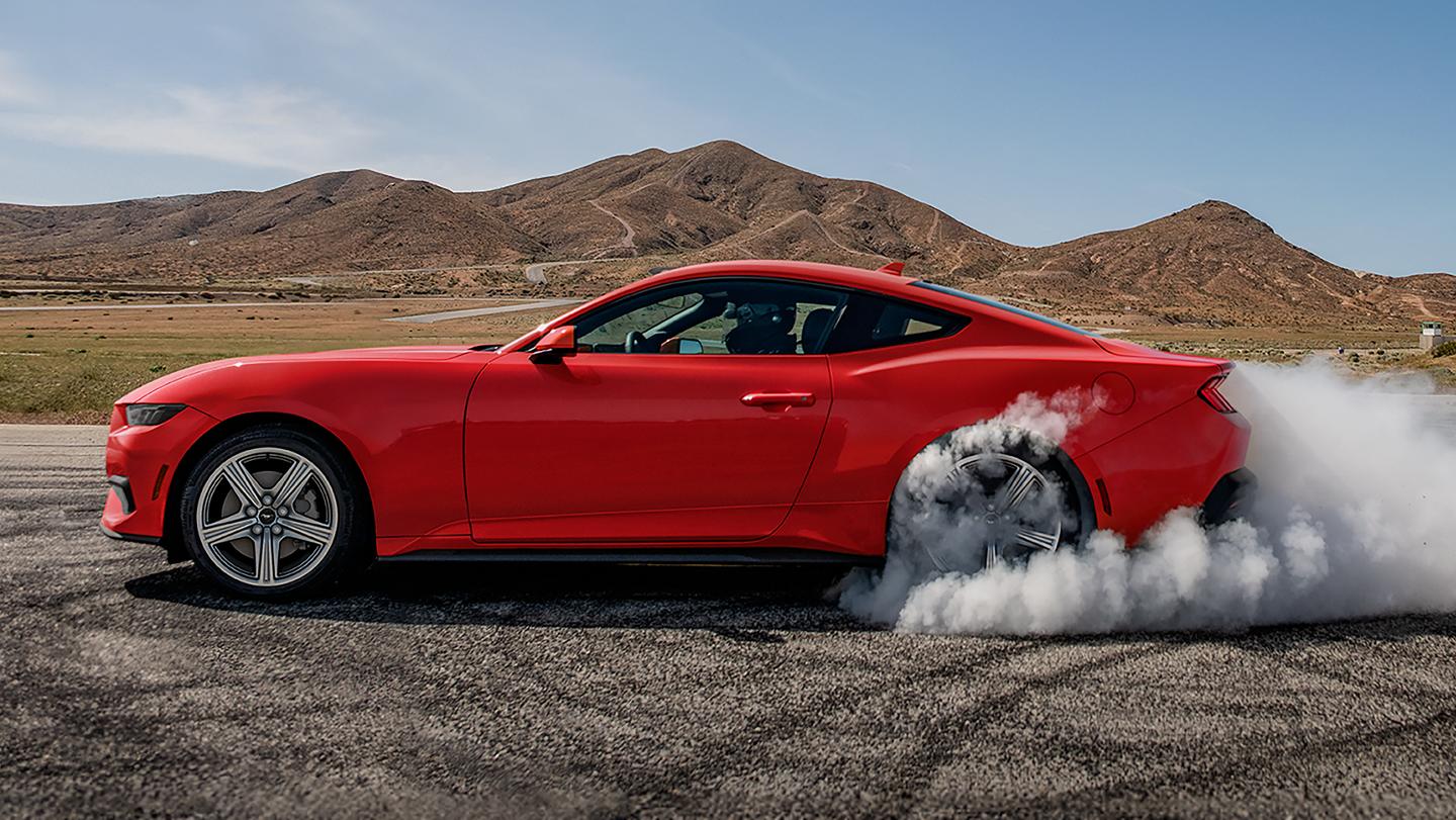 2026 Ford Mustang® EcoBoost® fastback in with a driver doing burnouts on a closed course 