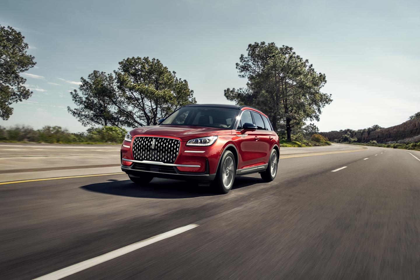 A 2026 Lincoln Corsair® SUV is being driven on a countryside road