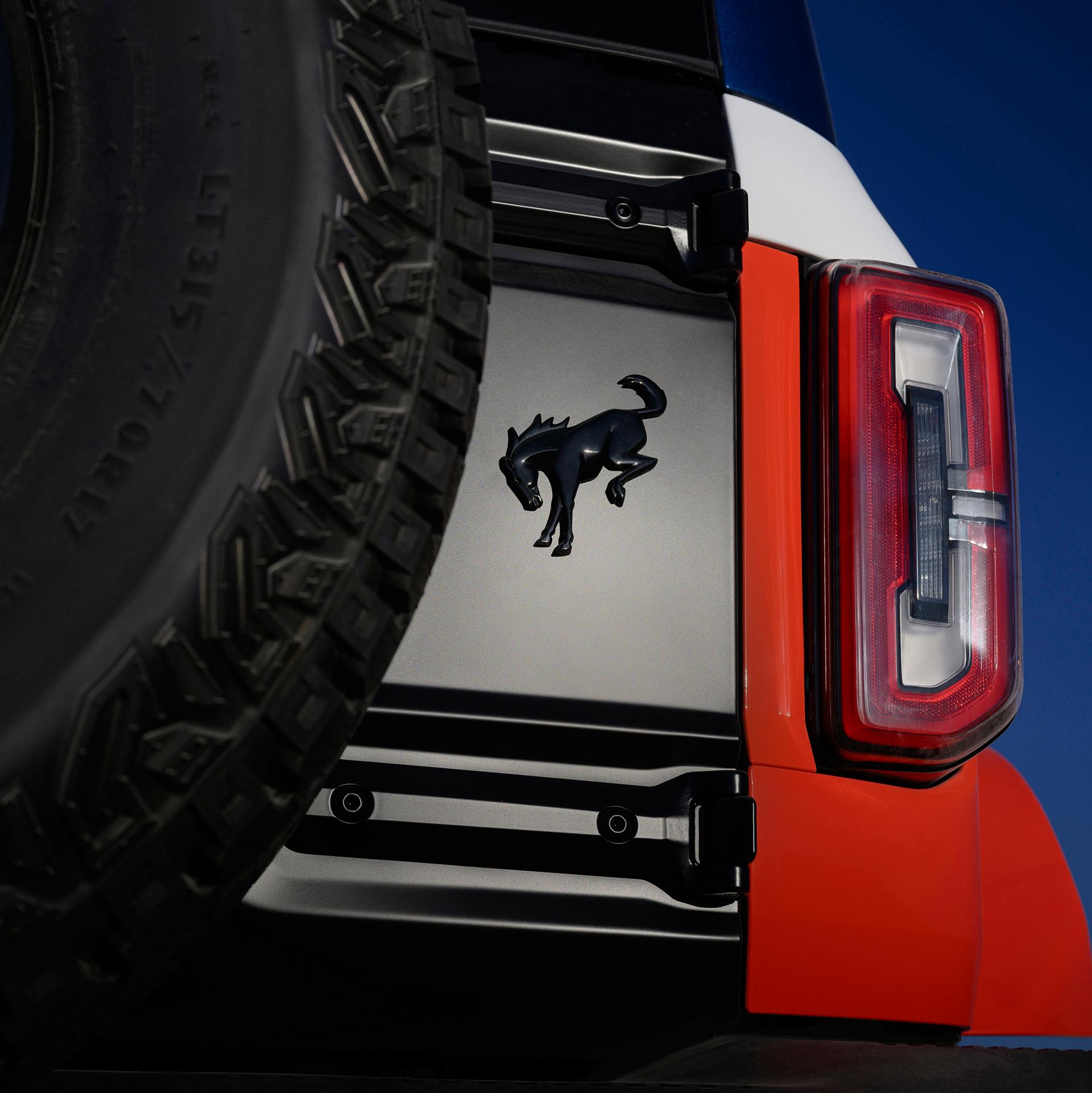 A close-up of the Bronco badge on the rear swing gate of a 2026 Ford Bronco® Stroppe Edition SUV