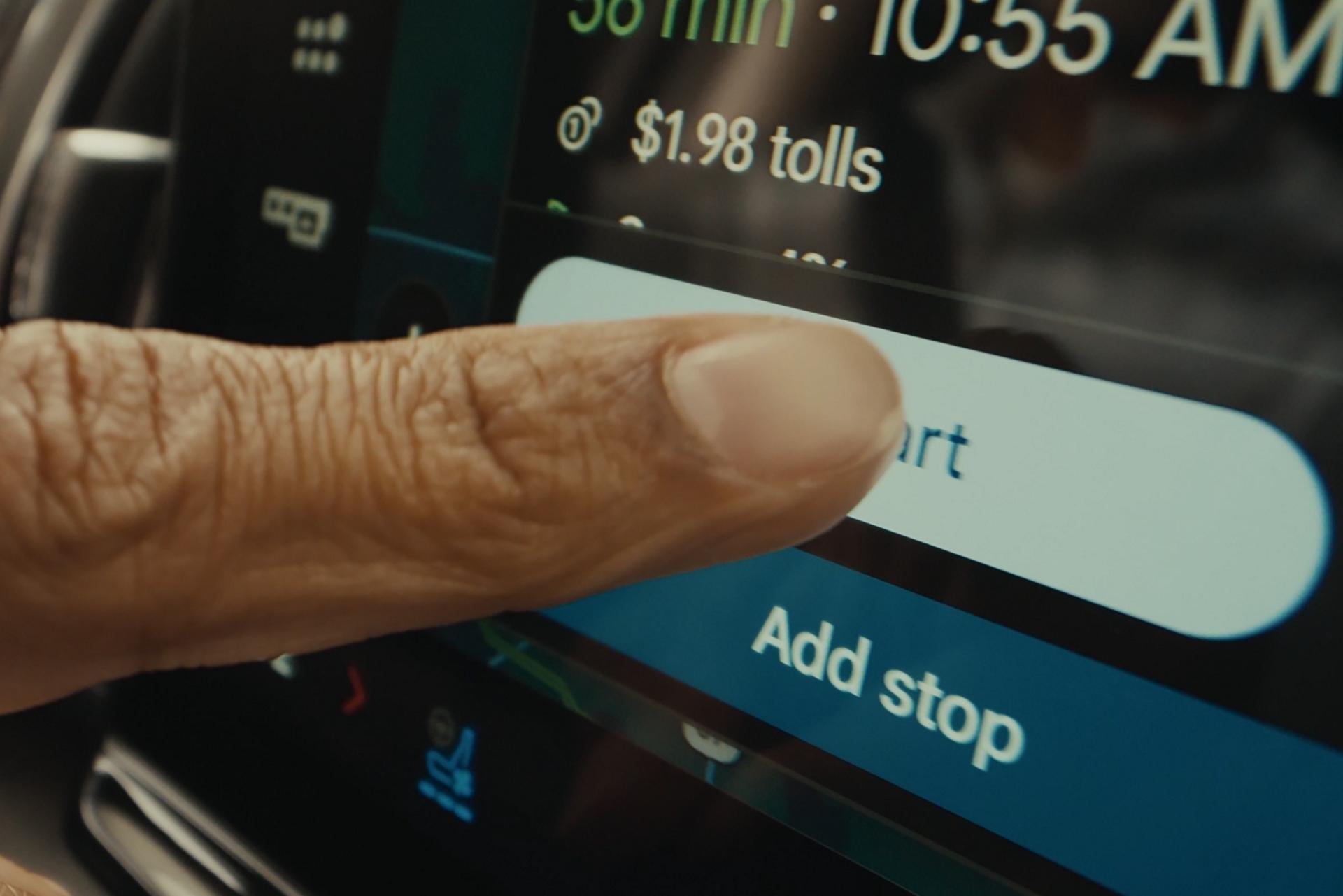 Person using available Ford Digital Experience features in a 2026 Ford Expedition® SUV