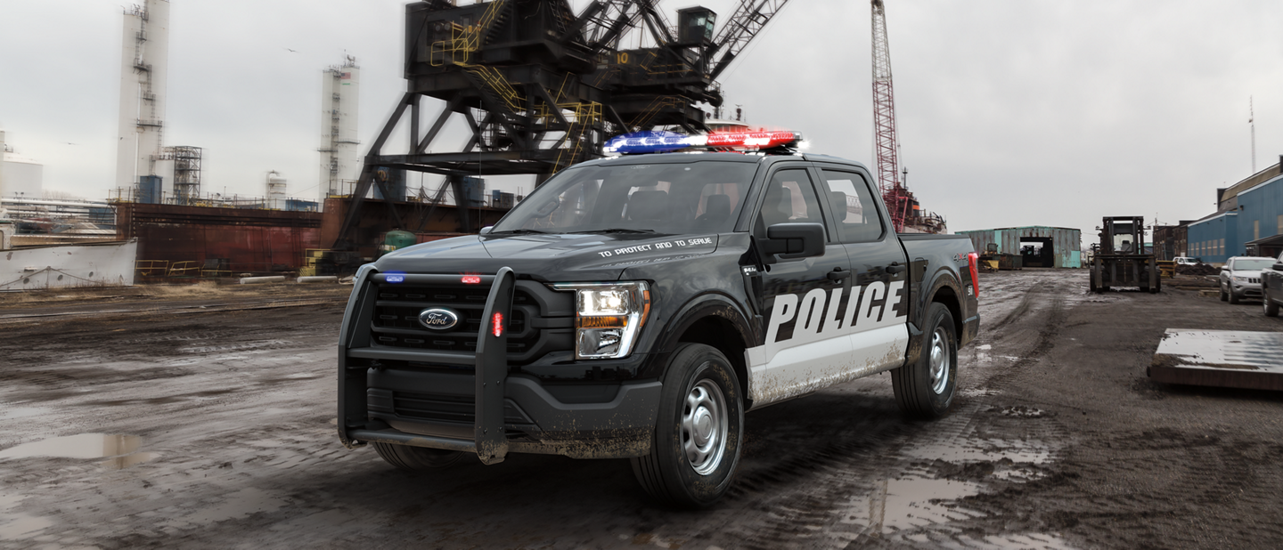 The ford f one fifty special service vehicle parked at a city shipyard