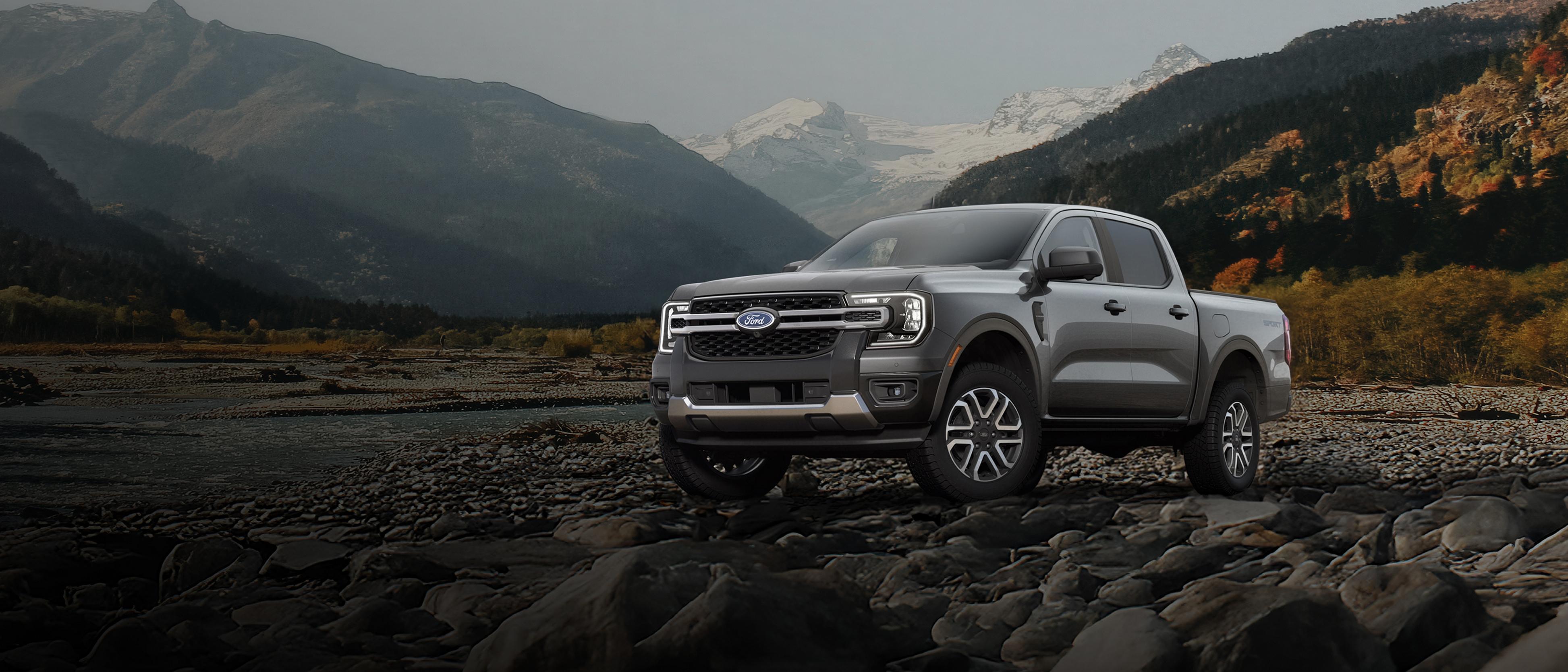 2026 Ford Ranger® Lariat® truck parked on a dirt road in the mountains