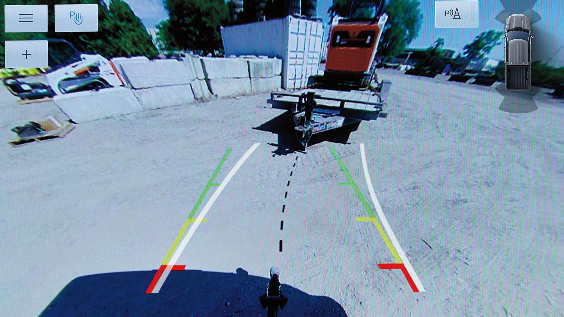 The center display of a 2026 Ford F-150® pickup with the Dynamic Hitch Assist guidelines on screen