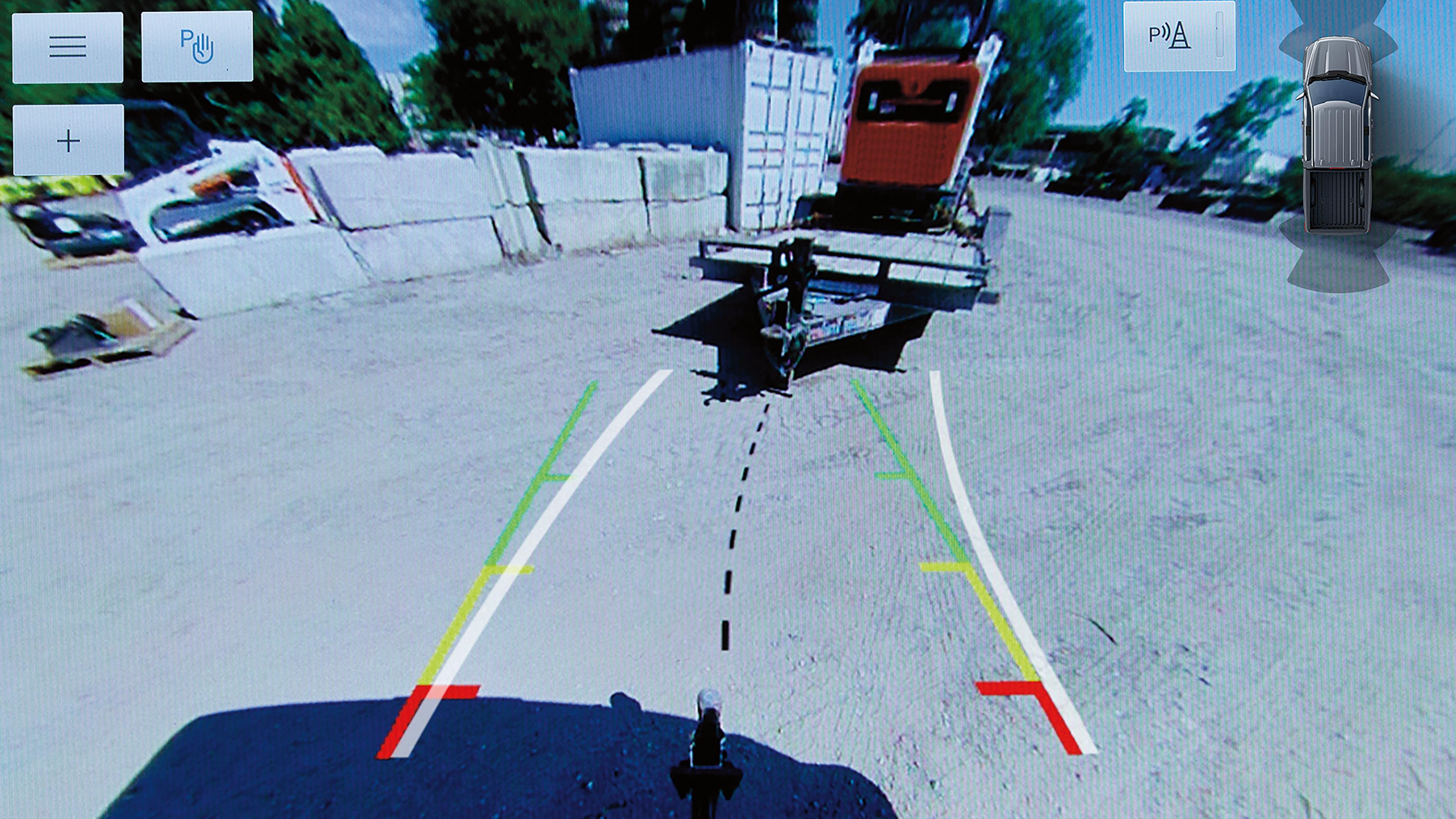 The center display of a 2026 Ford F-150® pickup with the Dynamic Hitch Assist guidelines on screen