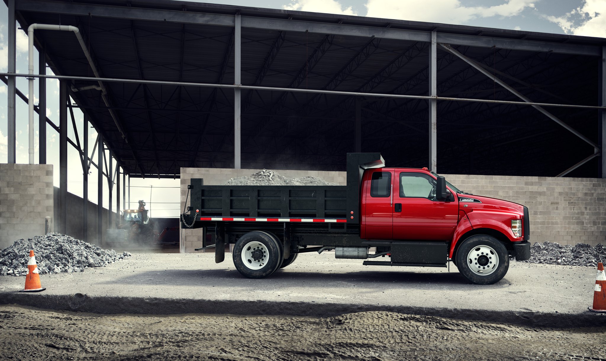 2026 Ford F-650® SuperCab shown in Race Red with dump truck upfit