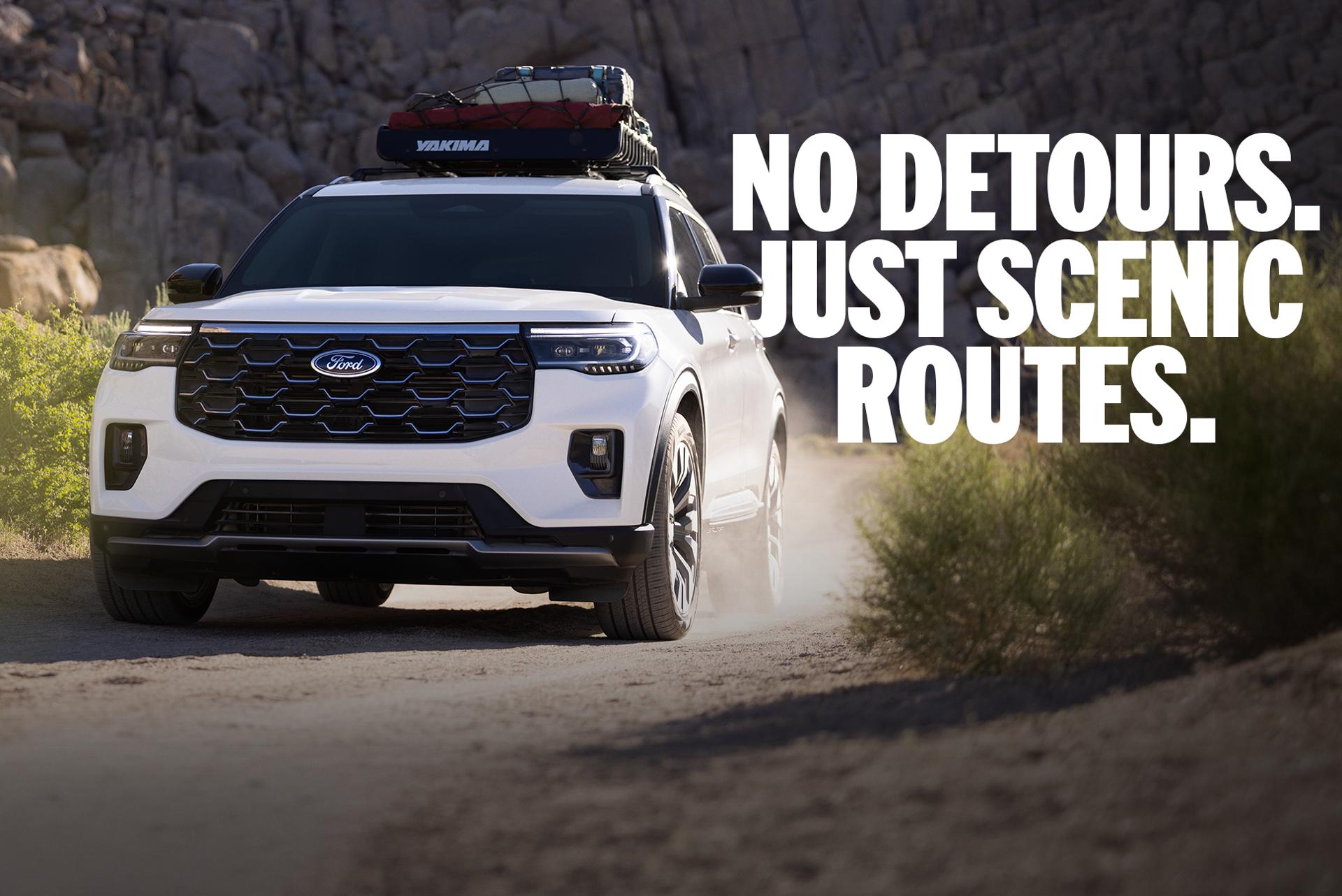 A 2027 Ford Explorer® Platinum™ SUV being driven through a canyon, with the caption: "No Detours. Just Scenic Routes."