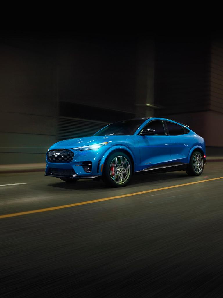 2026 Ford Mustang Mach-E® GT being driven on a road