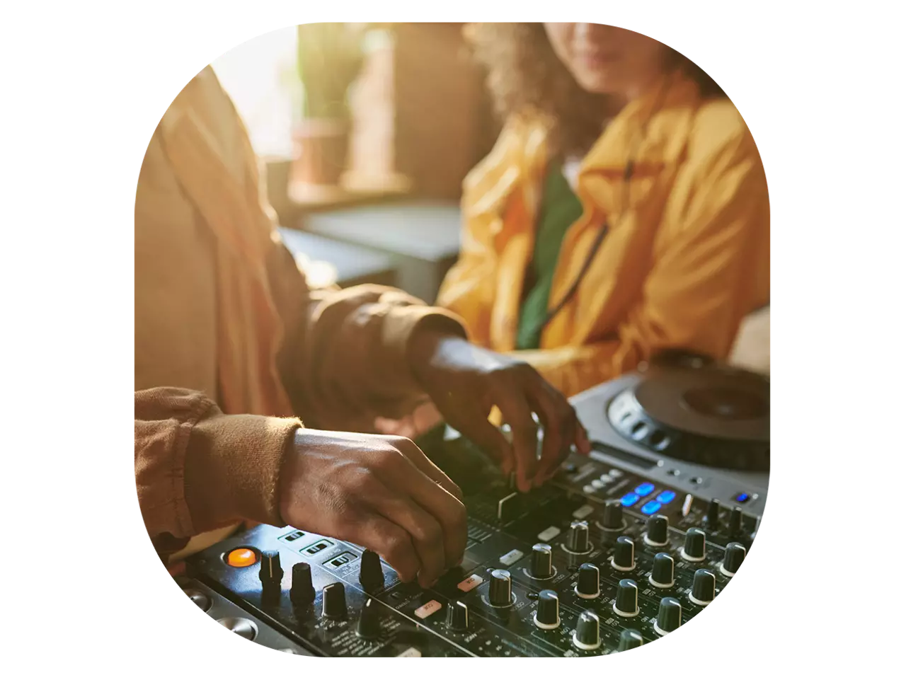 Two people DJing