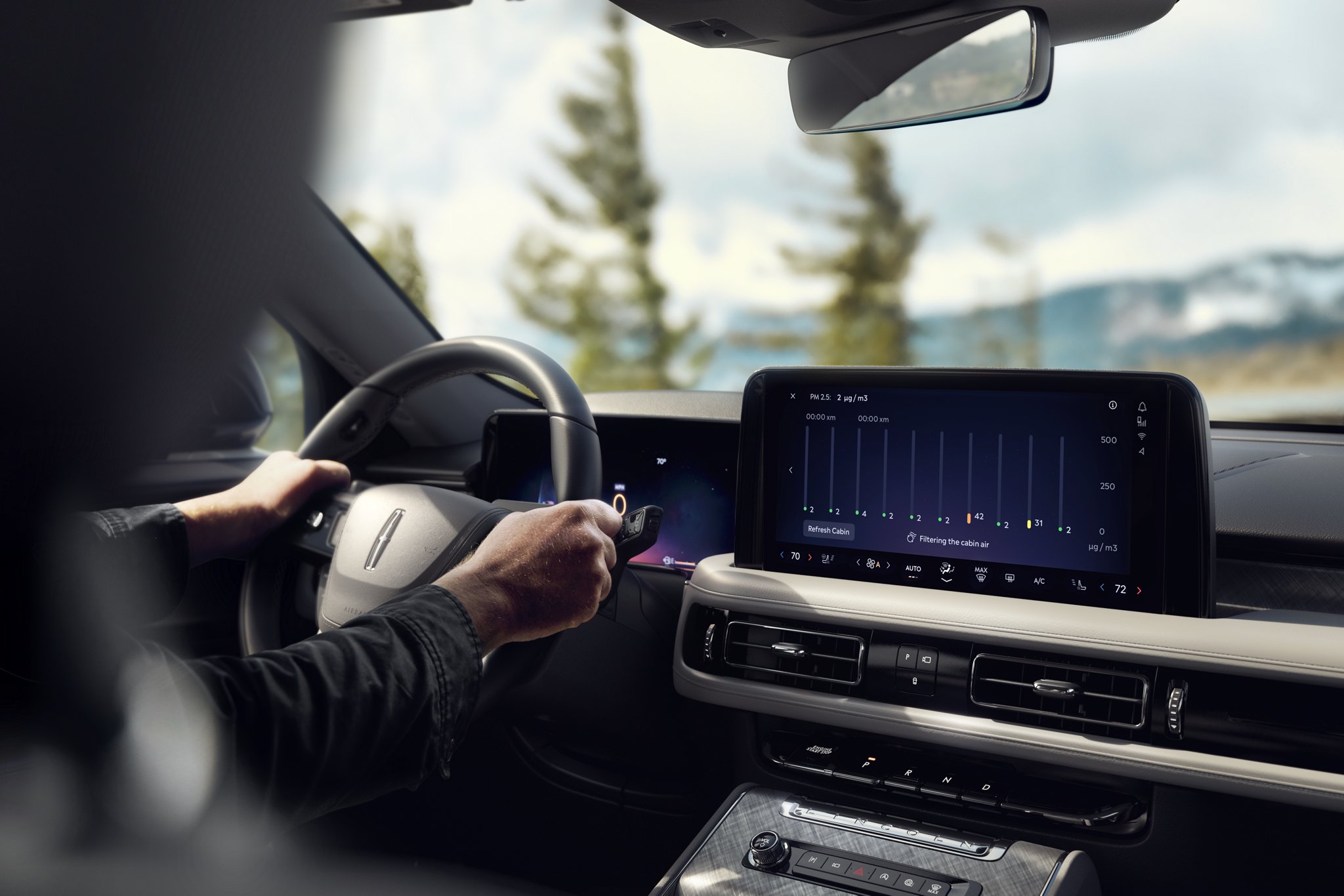 A man driving the 2025 Lincoln Aviator.