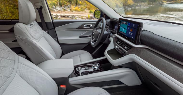 The interior of a 2026 Ford Explorer® Platinum™ SUV, showing the available Lux Leather Package