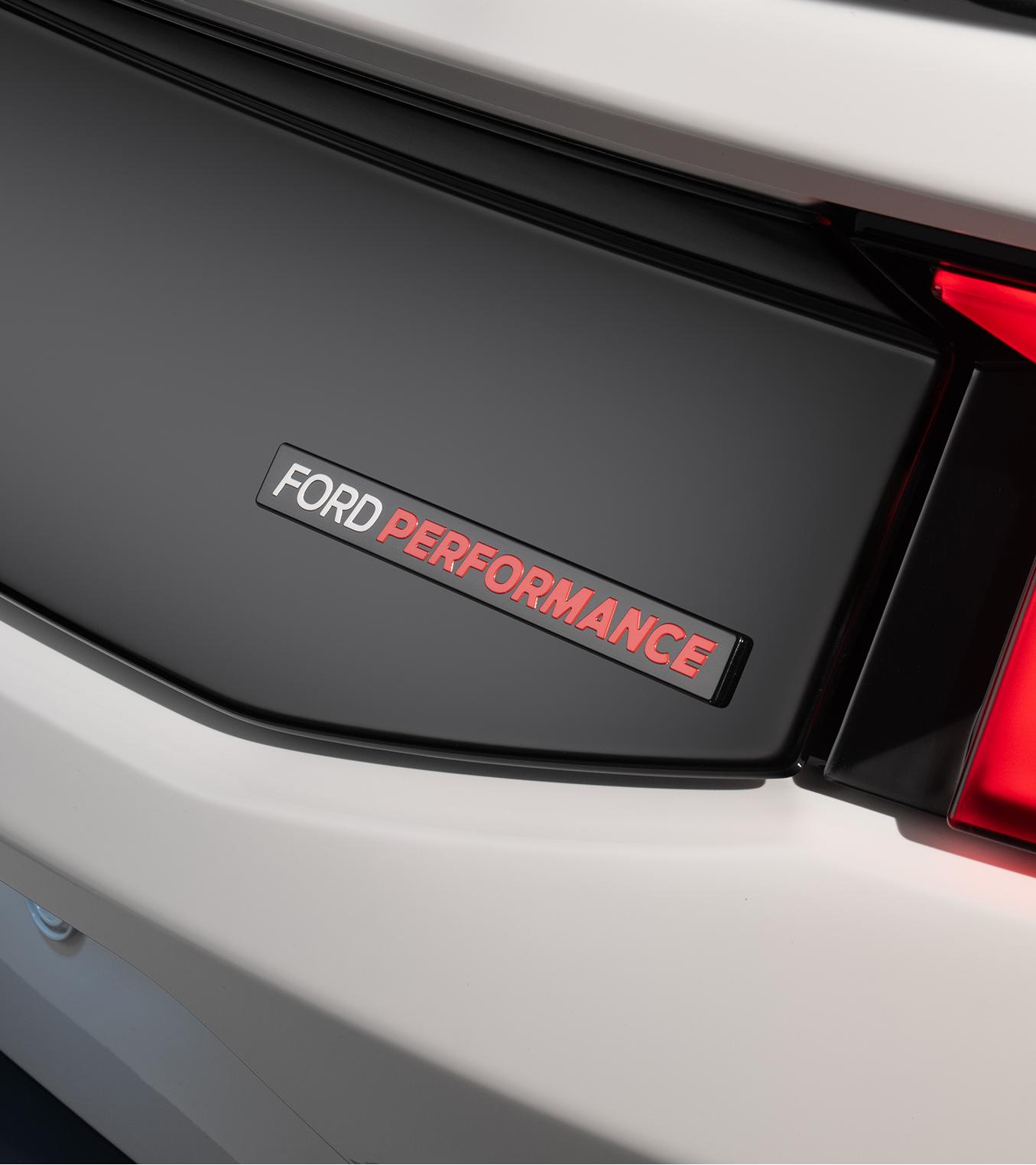Rear quarter detail showing the Ford Performance rear badge beside the taillight