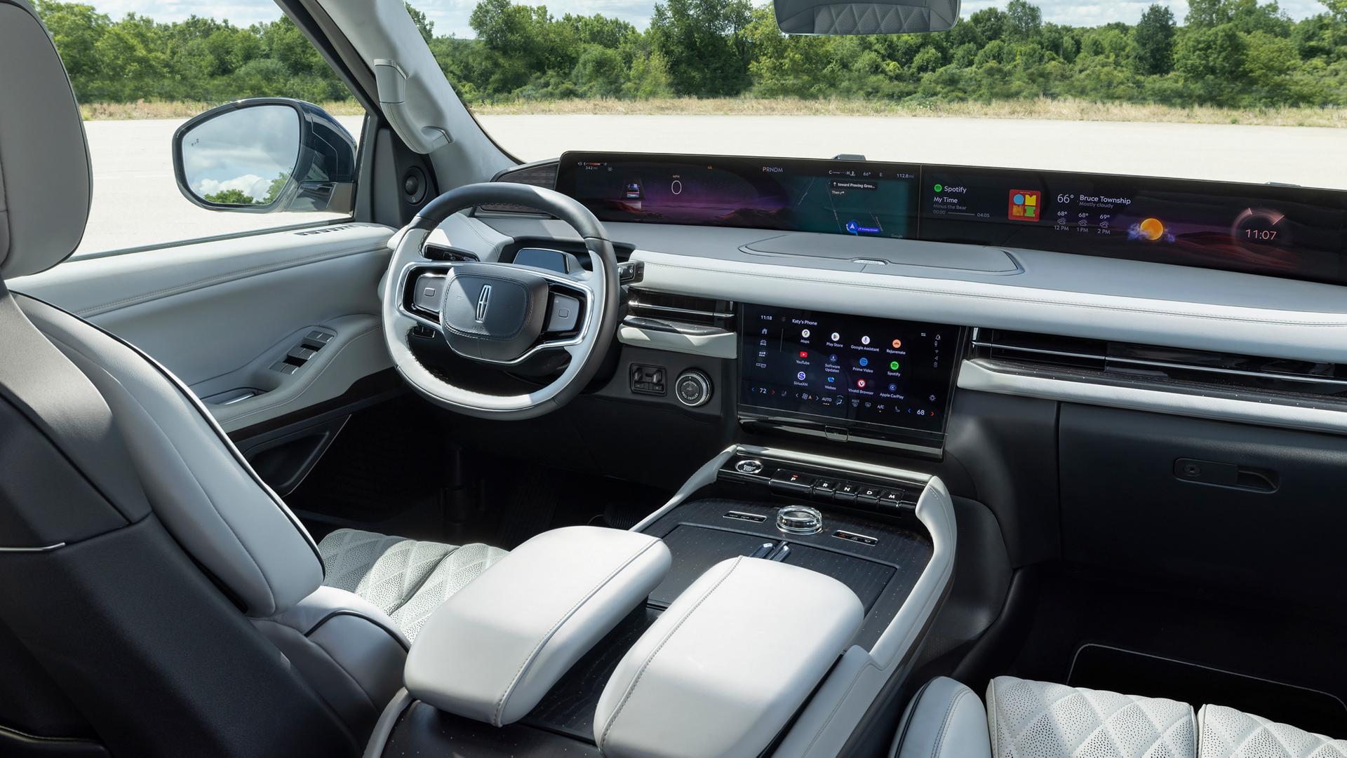 The interior front of a 2026 Lincoln Black Label with the Atmospheric theme