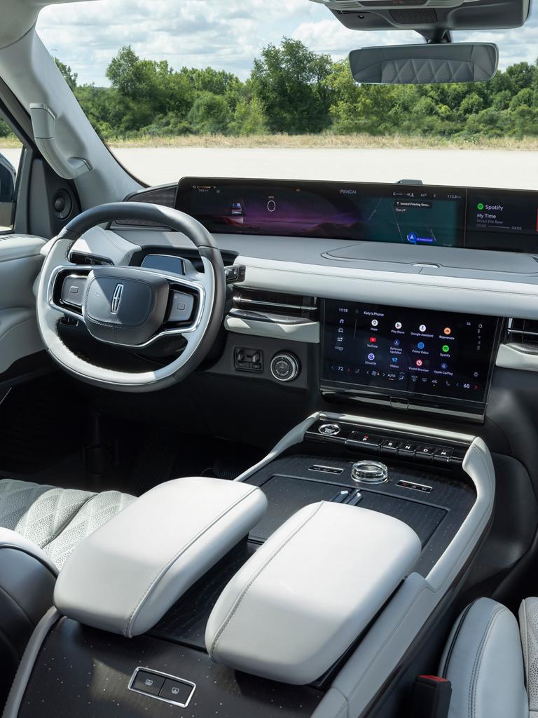The panoramic display of a 2026 Lincoln Navigator shown with a variety of apps showing on the center stack screen