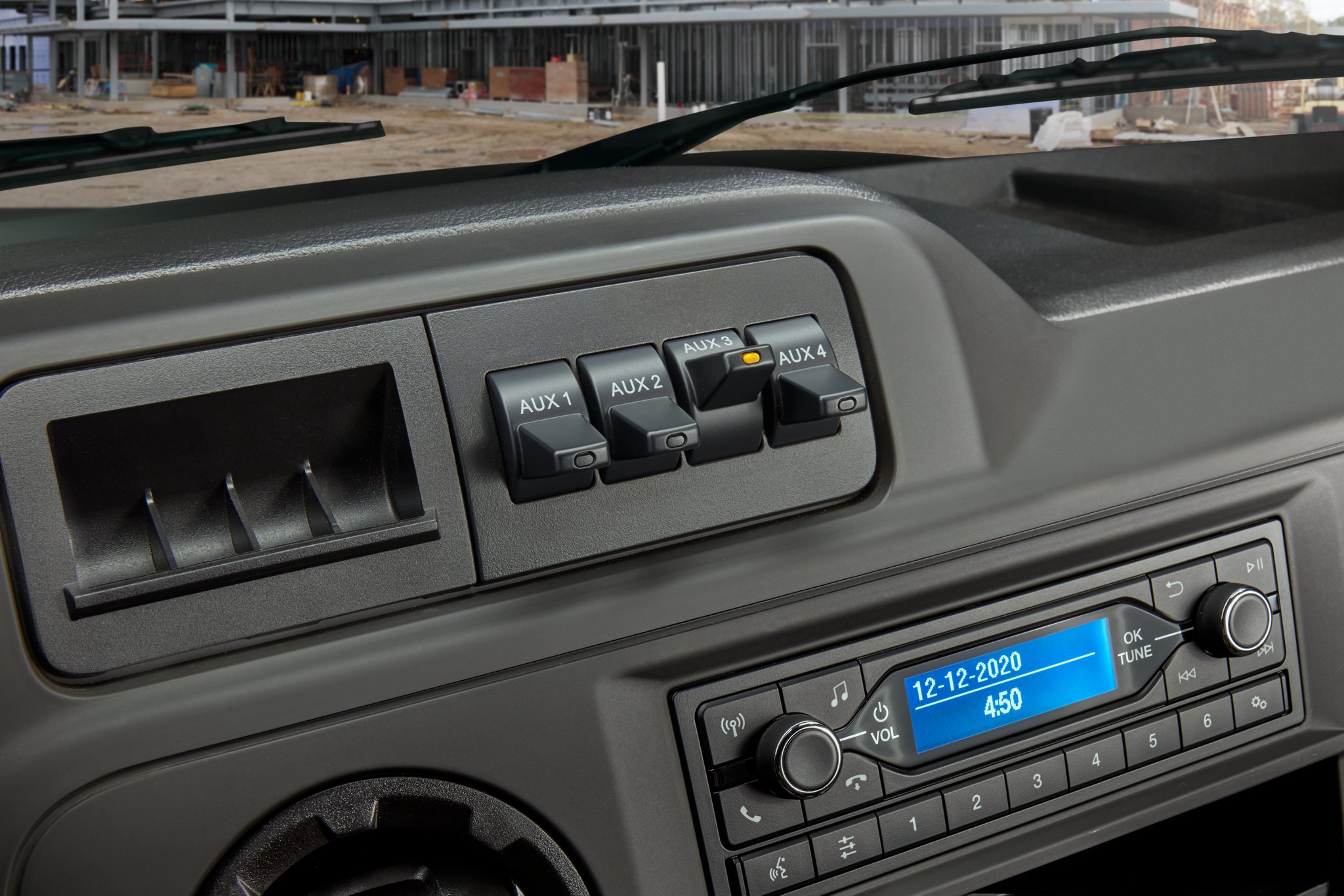 Close-up of the upfitter switches on the 2025 Ford E-Series Cutaway Instrument Panel